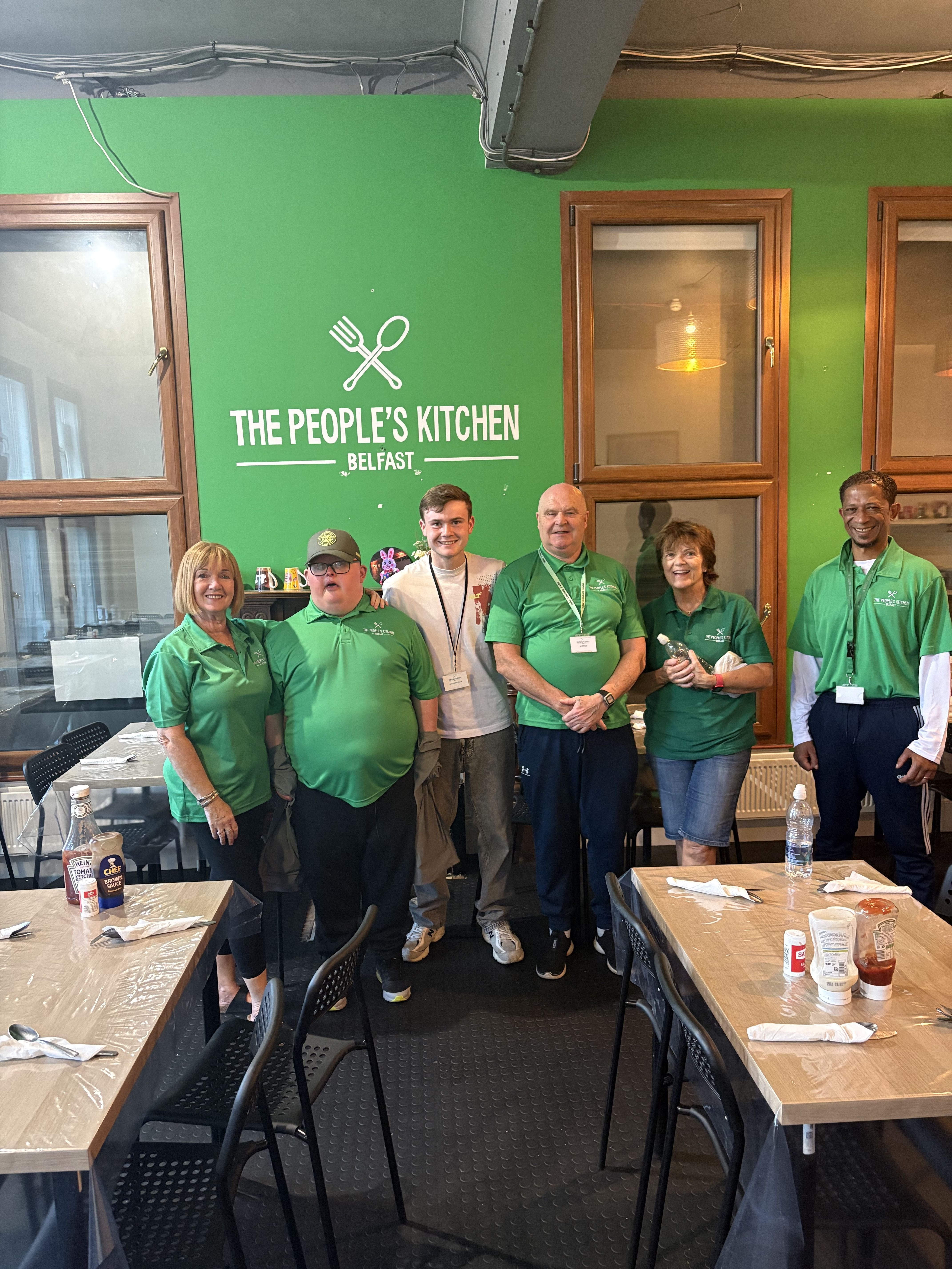 FUNDRAISING: Adam Devlin with some of his fellow volunteers at The People\'s Kitchen