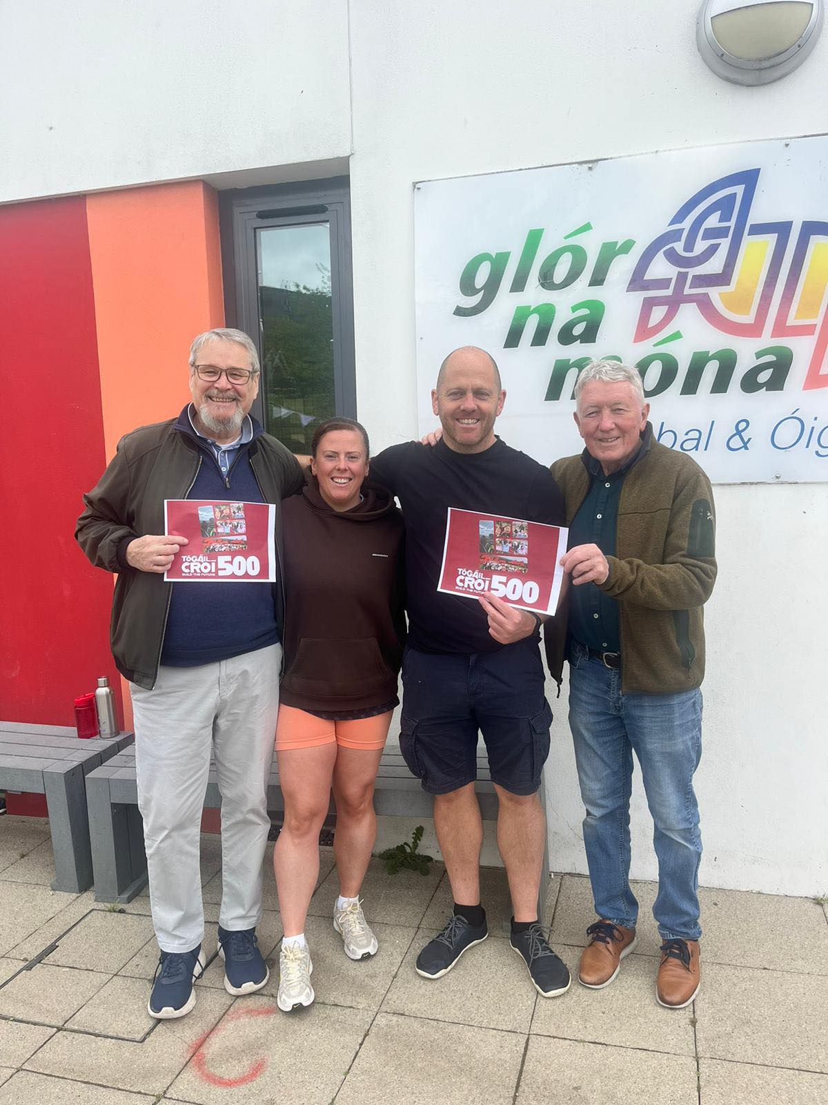 SUPPORT: Emma Ní Mhuiregáin and Feargal Mac Ionnrachtaigh from Glór na Móna with Seosamh Cnámh and Seamy Ó Ceallaigh who bought the first two bricks of the new campaign