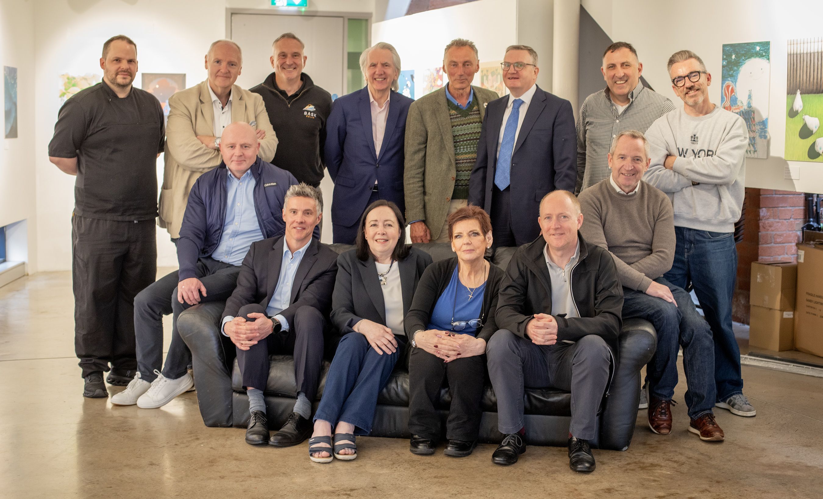 SOFA, SO GOOD: Attendees at Ciorcal Gnó Iarthar Bhéal Feirste with guest speaker (seated second from left) Colm Warren, CEO of Natural World Products