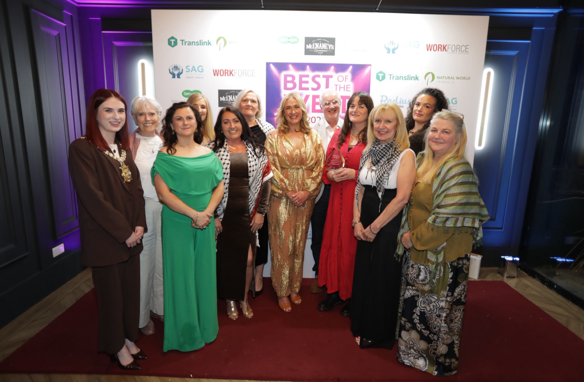 WORTHY WINNERS: Mothers Against Genocide received a special award and were joined on stage by Lord Mayor Róis-Máire Donnelly and Robin Livingstone, Group Editor, Belfast Media Group, 