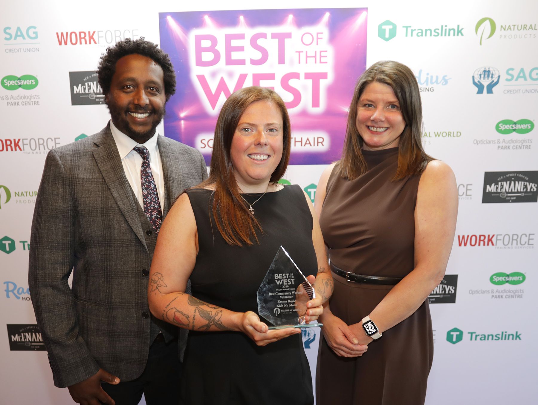 BEST COMMUNITY WORKER/VOLUNTEER: Joint-winner Emma Boyle from Glór Na Mona with Biruk Sahle and Sharon McMaster from sponsors Natural World Products