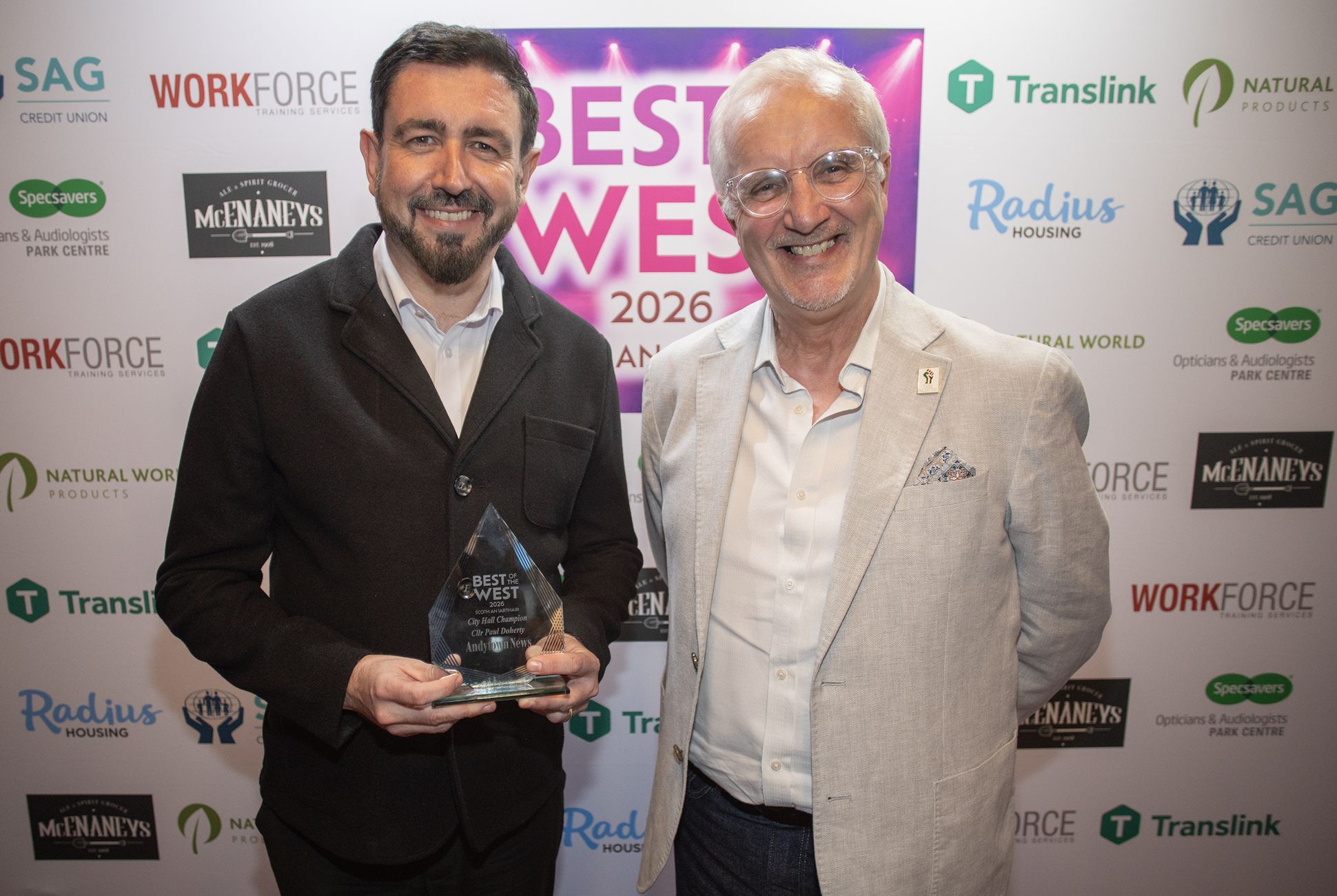 CITY HALL CHAMPION SPECIAL AWARD: Councillor Paul Doherty is presented with his award by Robin Livingstone, Group Editor of Belfast Media