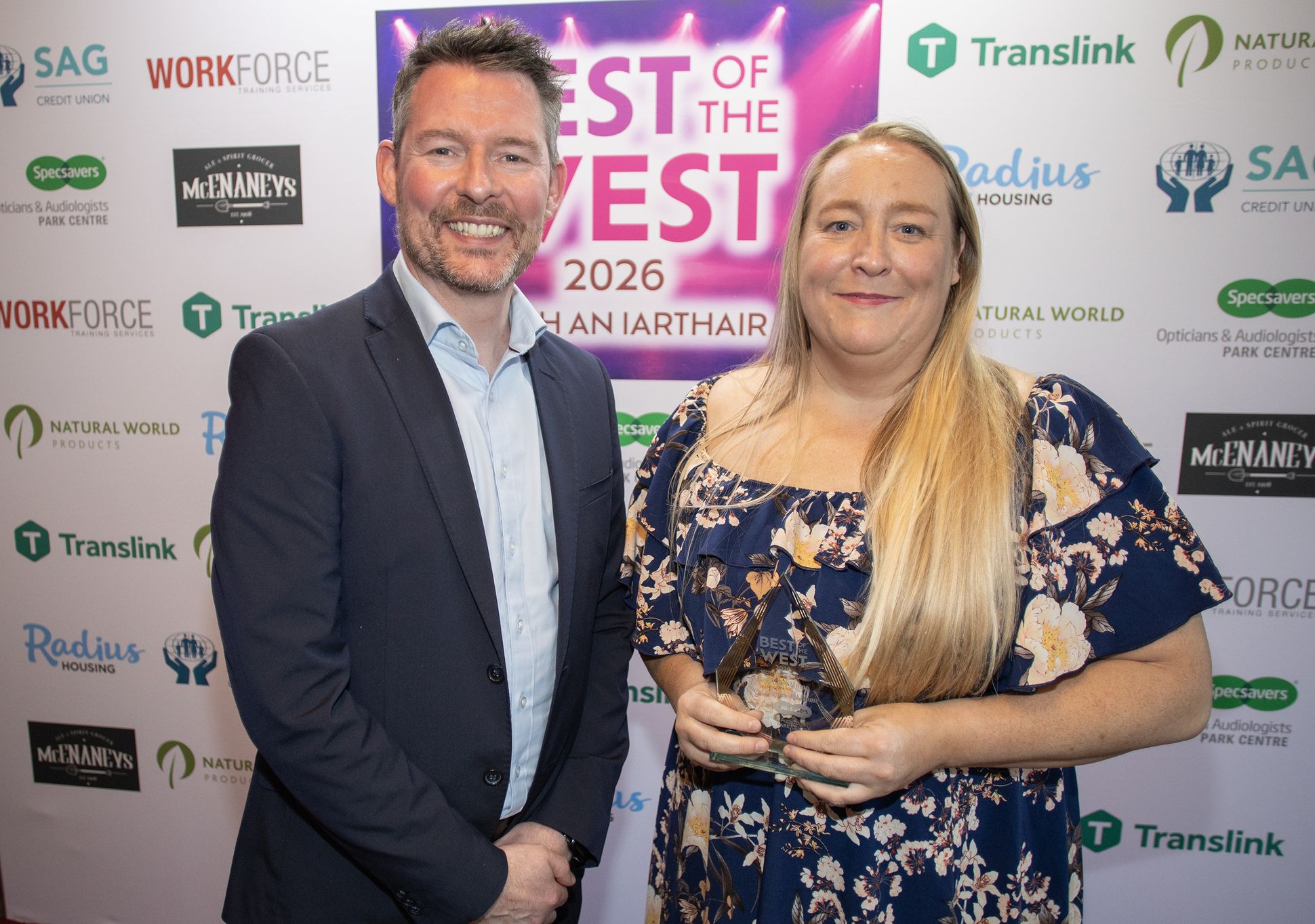 BEST CARE HOME: Margaret McGeown from Our Lady's Care Home with Matthew McKenny from sponsors Specsavers Park Centre