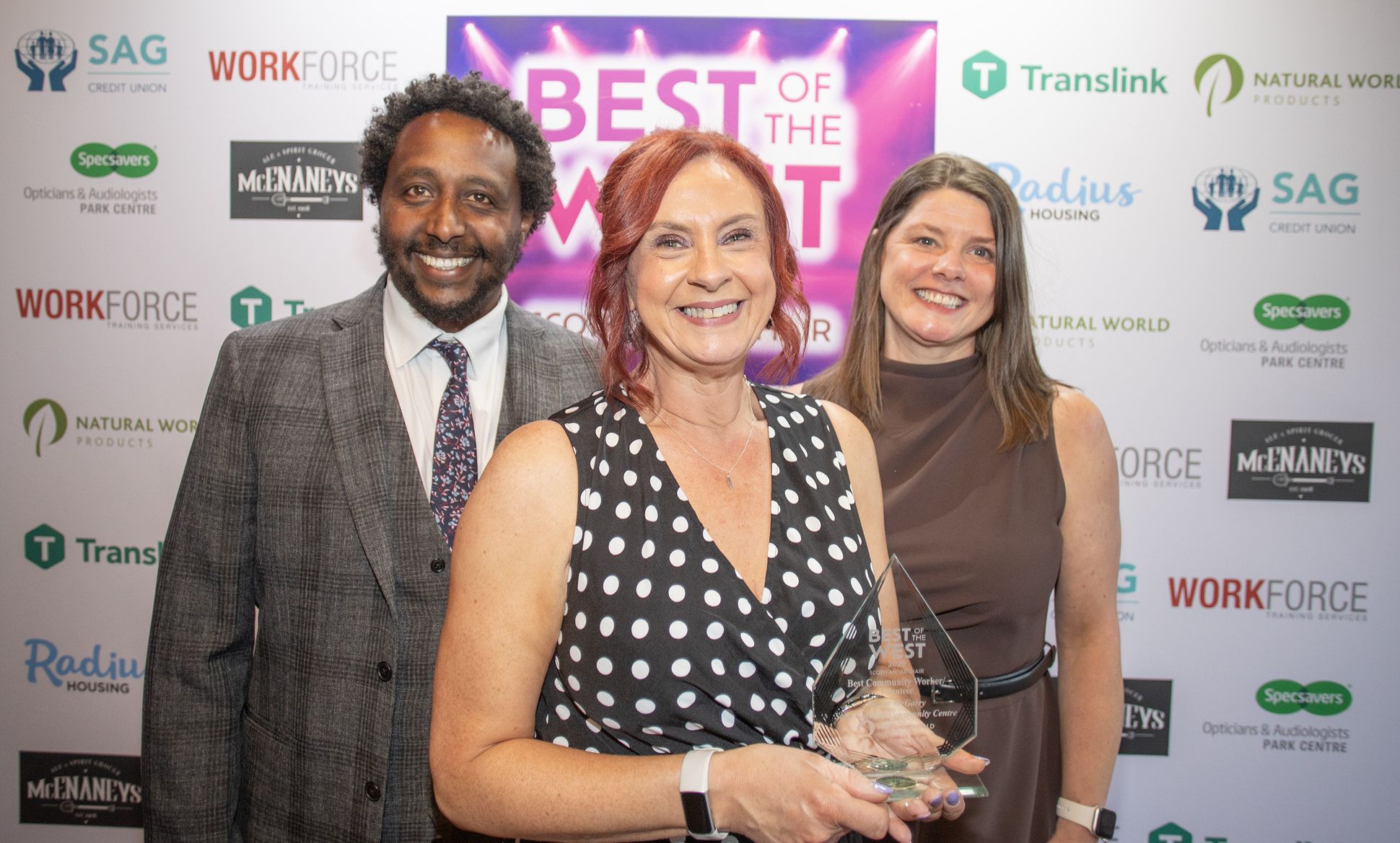 BEST COMMUNITY WORKER/VOLUNTEER: Joint-winner Roisin McGarry from Sally Gardens Community Centre with Biruk Sahle and Sharon McMaster from sponsors Natural World Products
