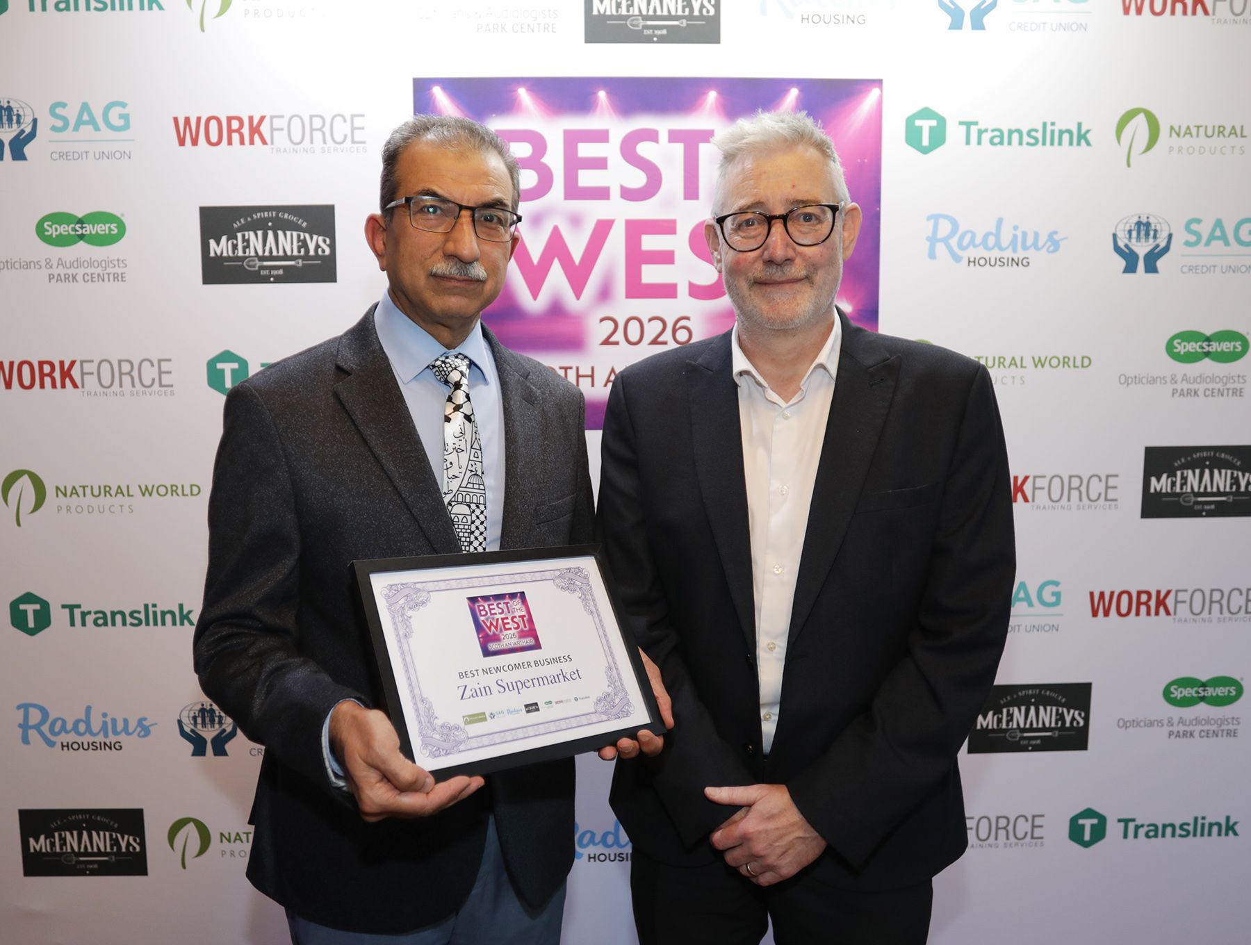 BEST NEWCOMER BUSINESS: Raied Al-Wazzan from joint-winners Zain Supermarket with Greer Wilson from sponsors Radius Housing