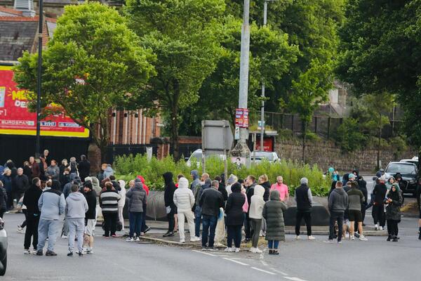 Man charged after North Belfast knife attack as violence erupts and homes set on fire
