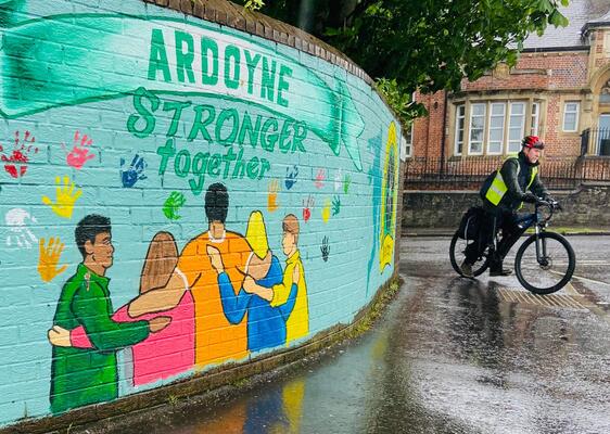 Ardoyne community rallies around ethnic minority families after threats 