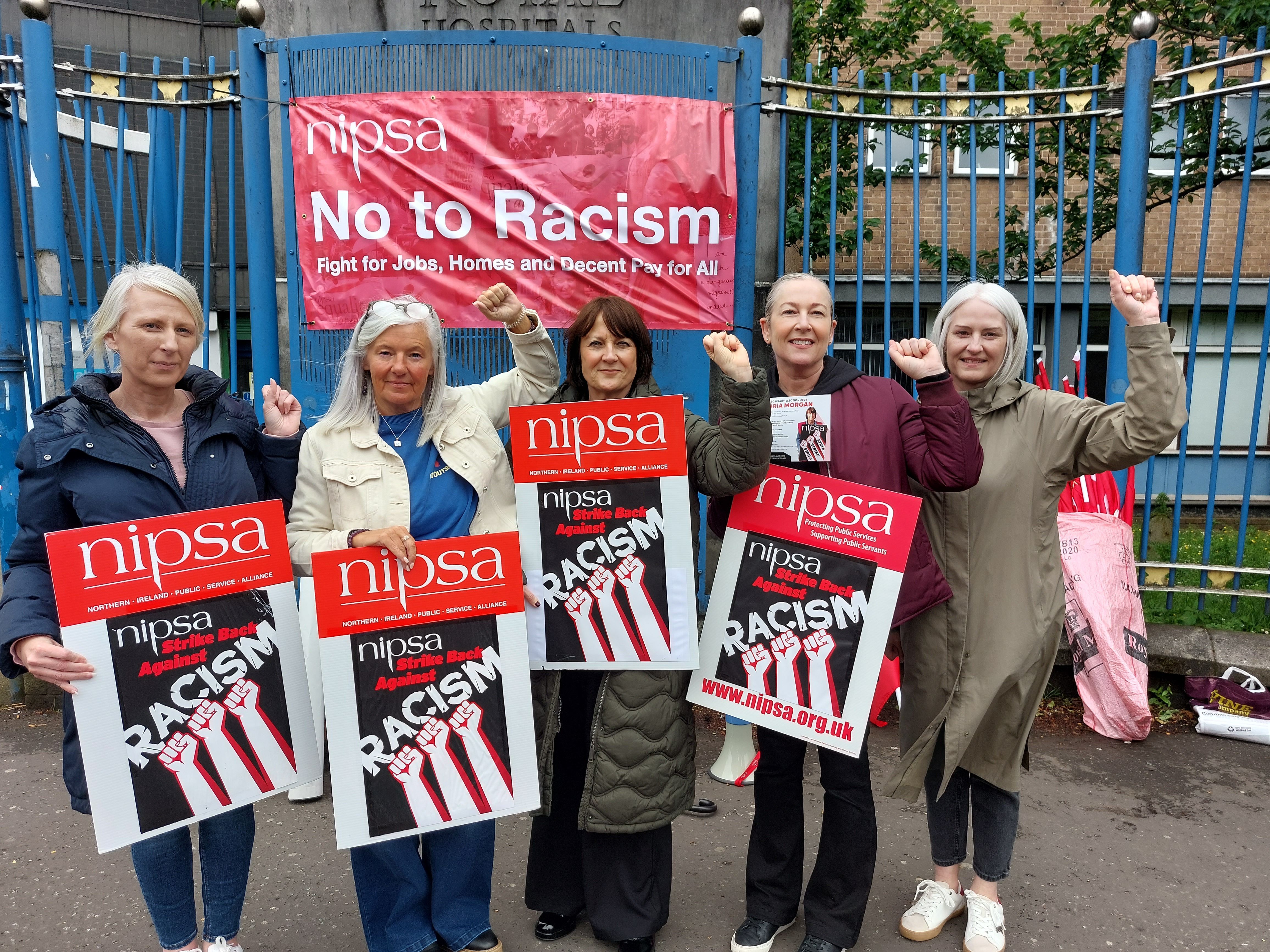 STANDING TOGETHER: NIPSA members outside the Royal Victoria Hospital on the Falls Road this afternoon, including Maria Morgan, deputy general secretary, centre