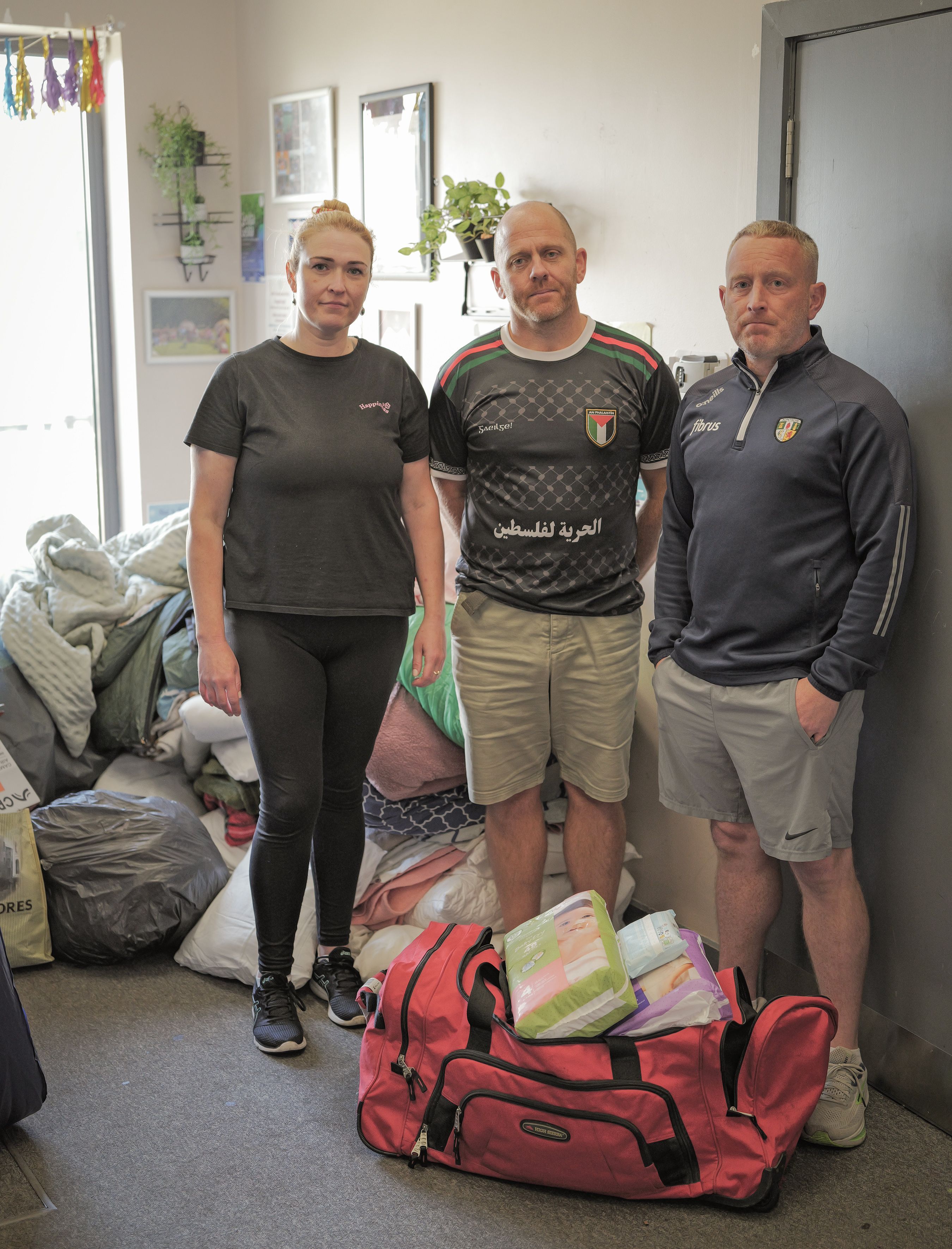 COMMUNITY RESPONSE: Nuala Ní Scolláin and Feargal Mac Ionnrachtaigh from Glór na Móna with community worker Seán Brady