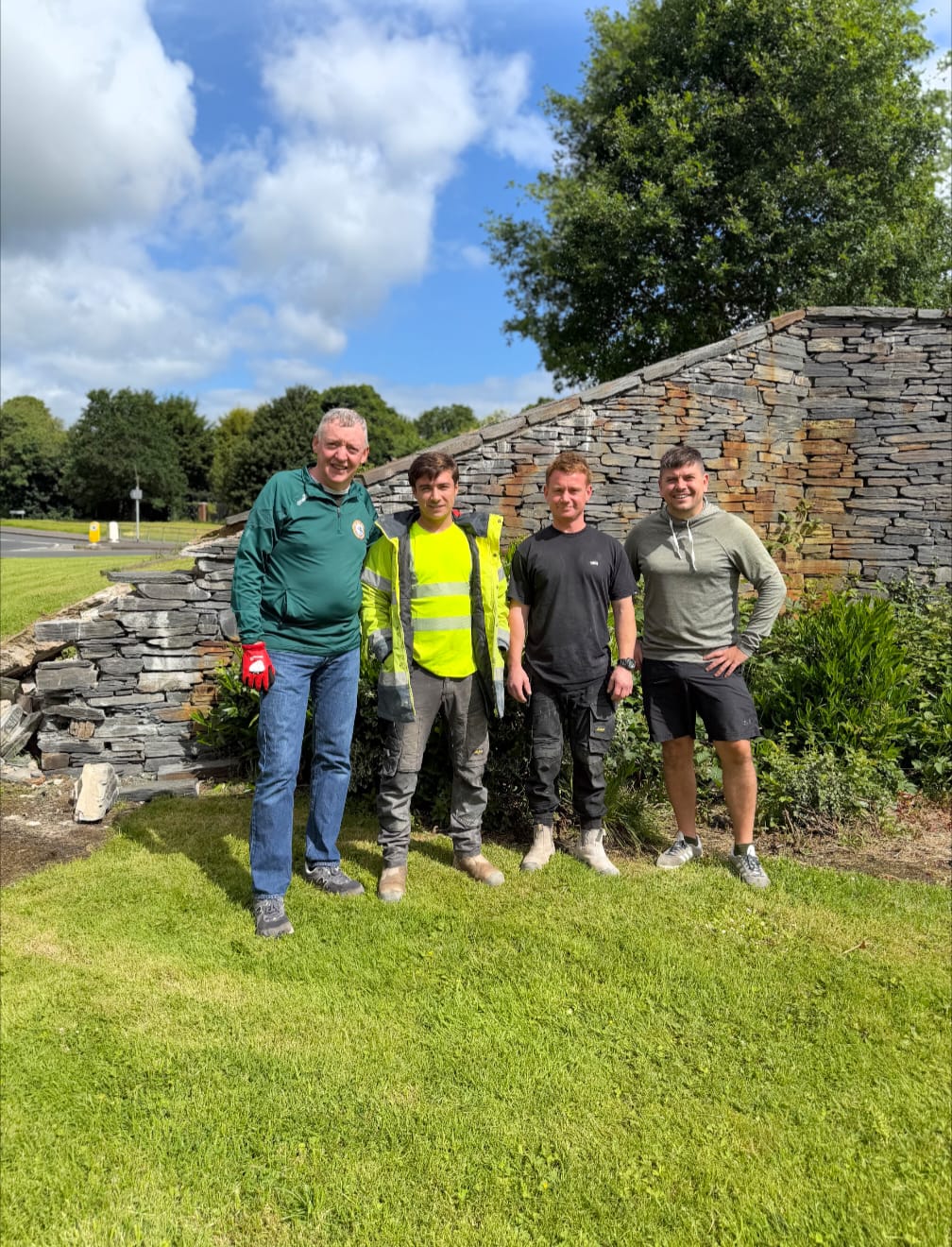 REPAIR WORK: Michael George, Ryan and Louis Adams and Danny Baker MLA at Michael Ferguson Roundabout 