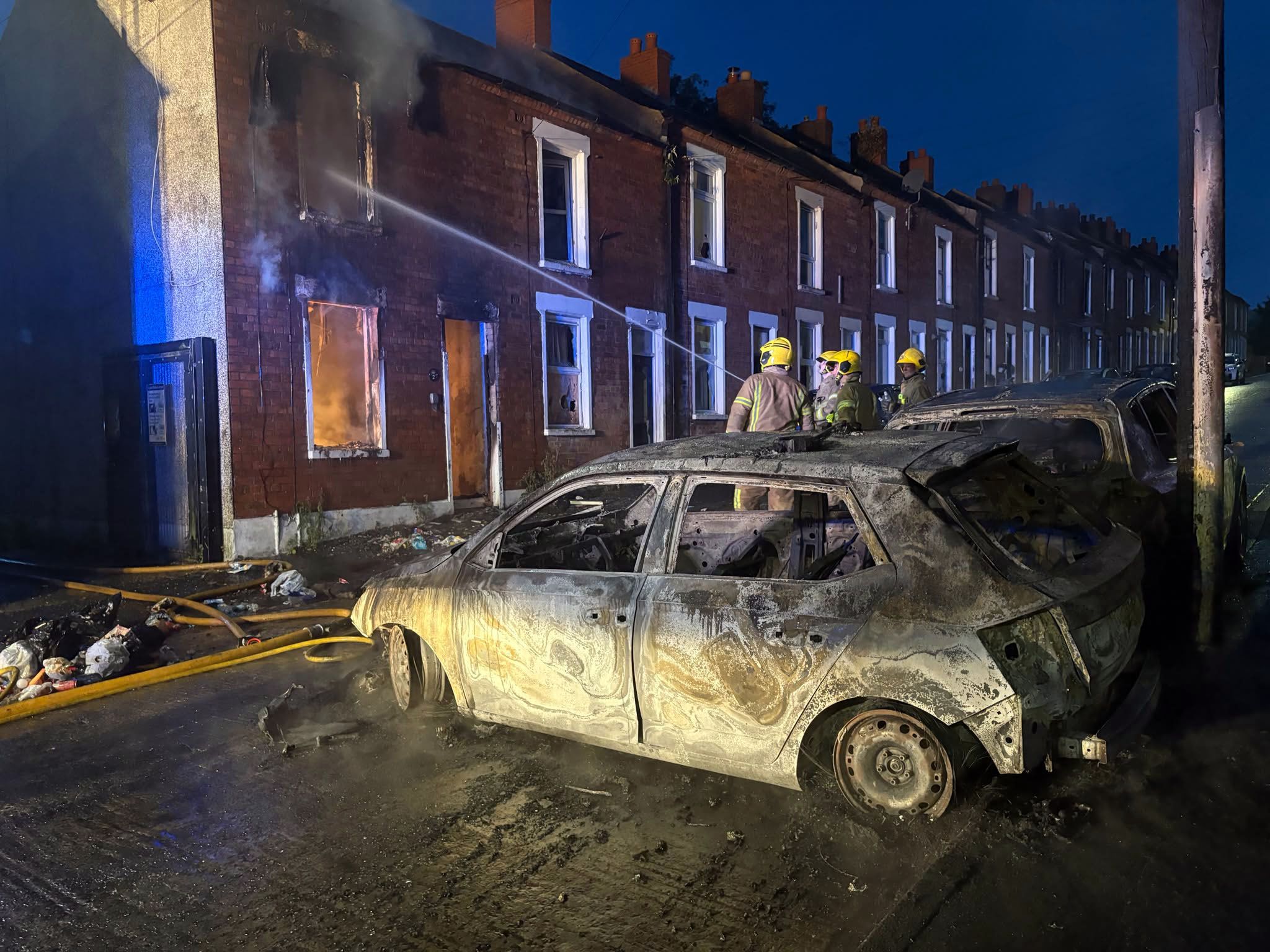 POGROM: Firefighters in East Belfast after racists forced migrant families to flee; the response of anti-racists has been inspirational