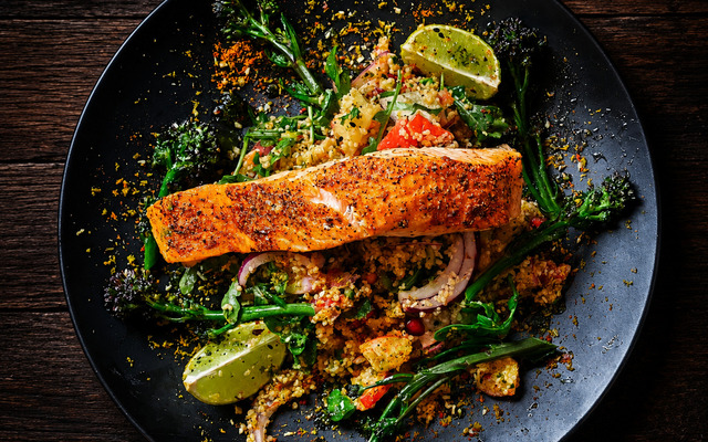 PLATING UP: Cajun spiced salmon on  curried spice couscous