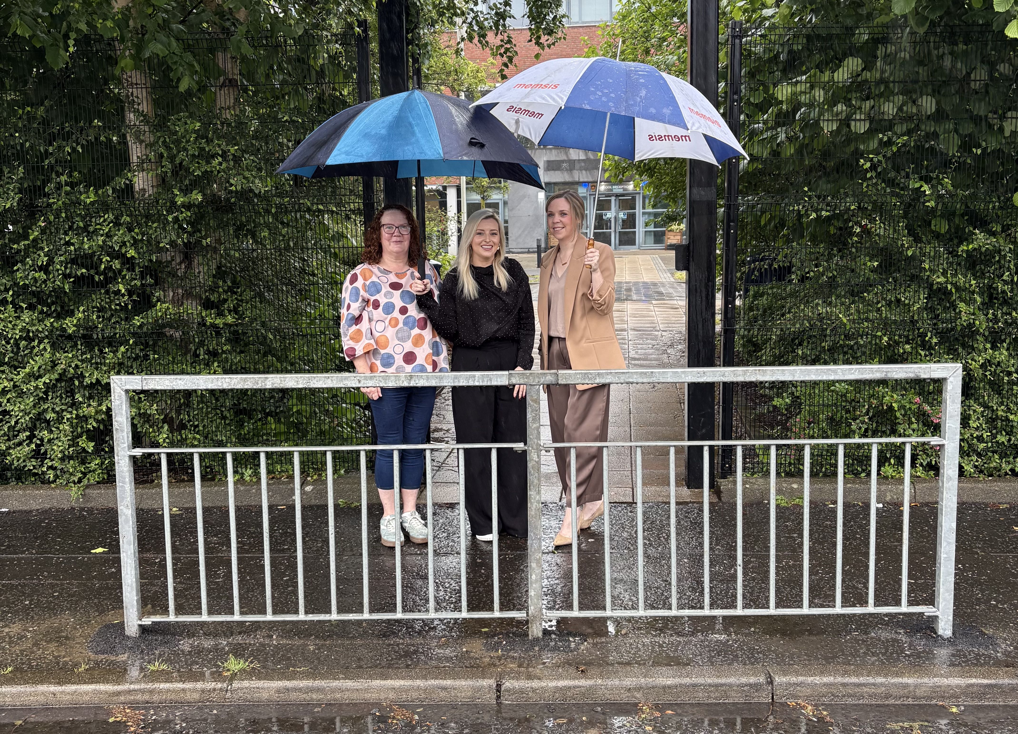 SAFETY BARRIER: Councillor Aine McCabe, Órlaithí Flynn MLA and Áine Best from De La Salle College