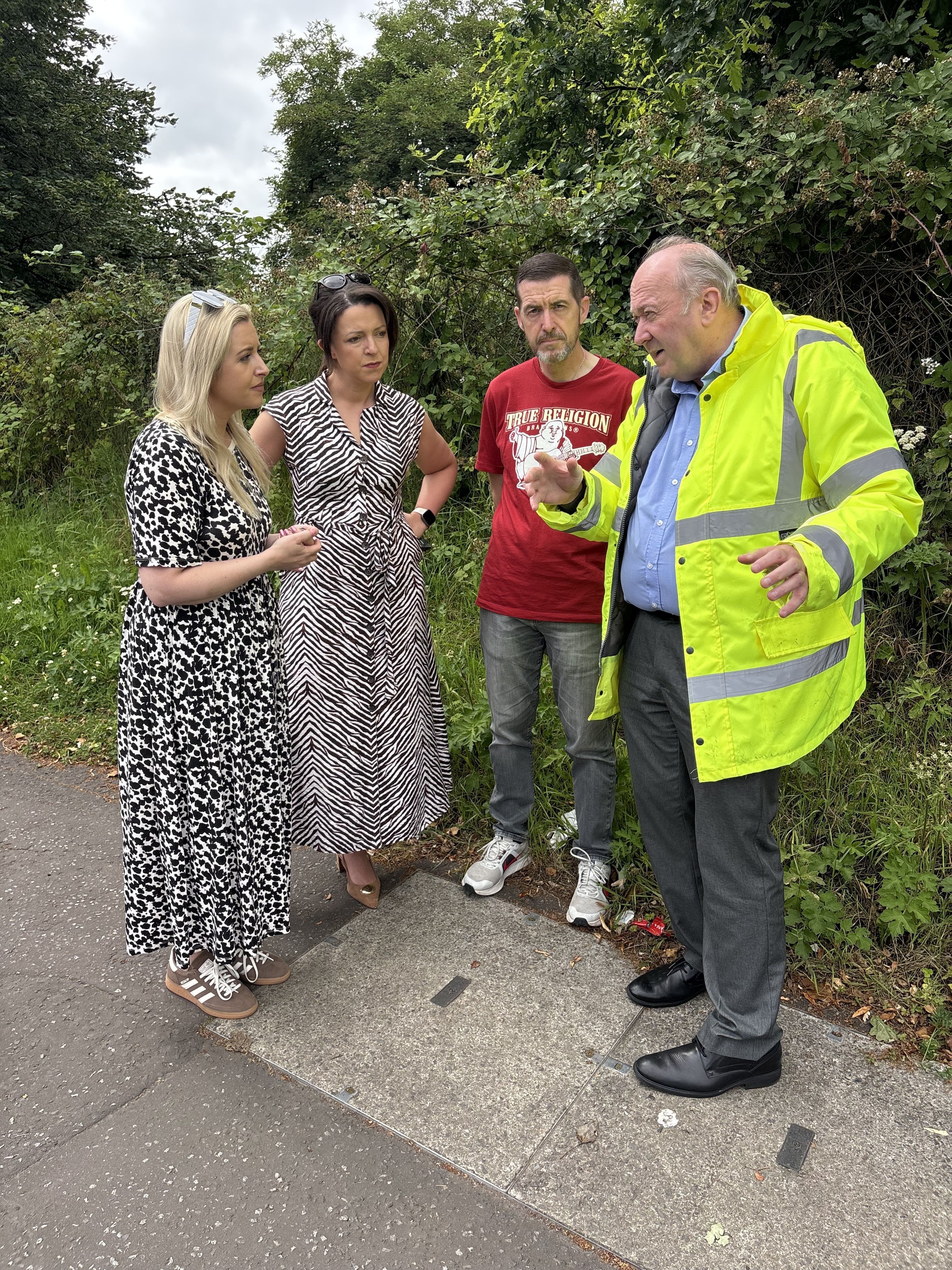 SITE MEETING: West Belfast MLA Órlaithí Flynn, Infrastructure Minister Liz Kimmins and Councillor Matt Garrett with a DfI official
