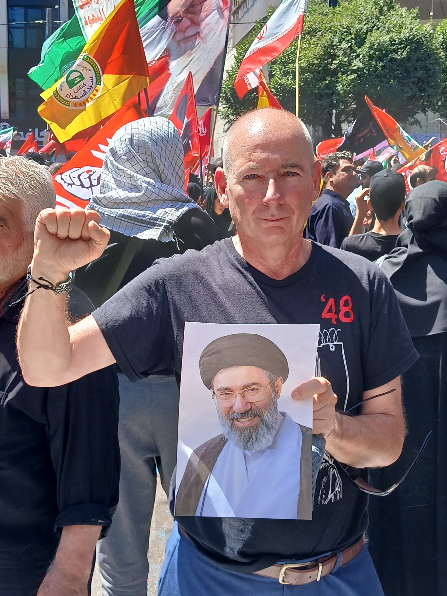 SOLIDARITY: Fra Hughes at the funeral of Ayatollah Ali Khamenei.