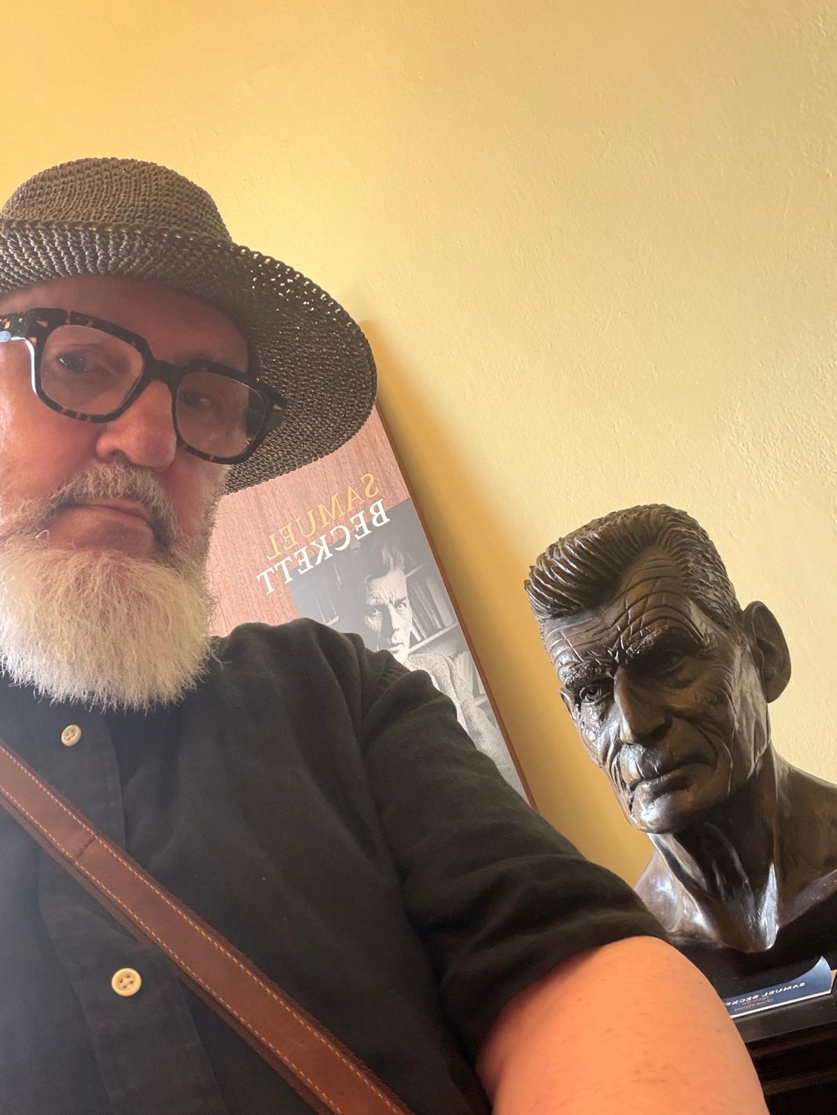 WAITING FOR GODOT: Frank Liddy by a bust of Samuel Beckett at MOLI