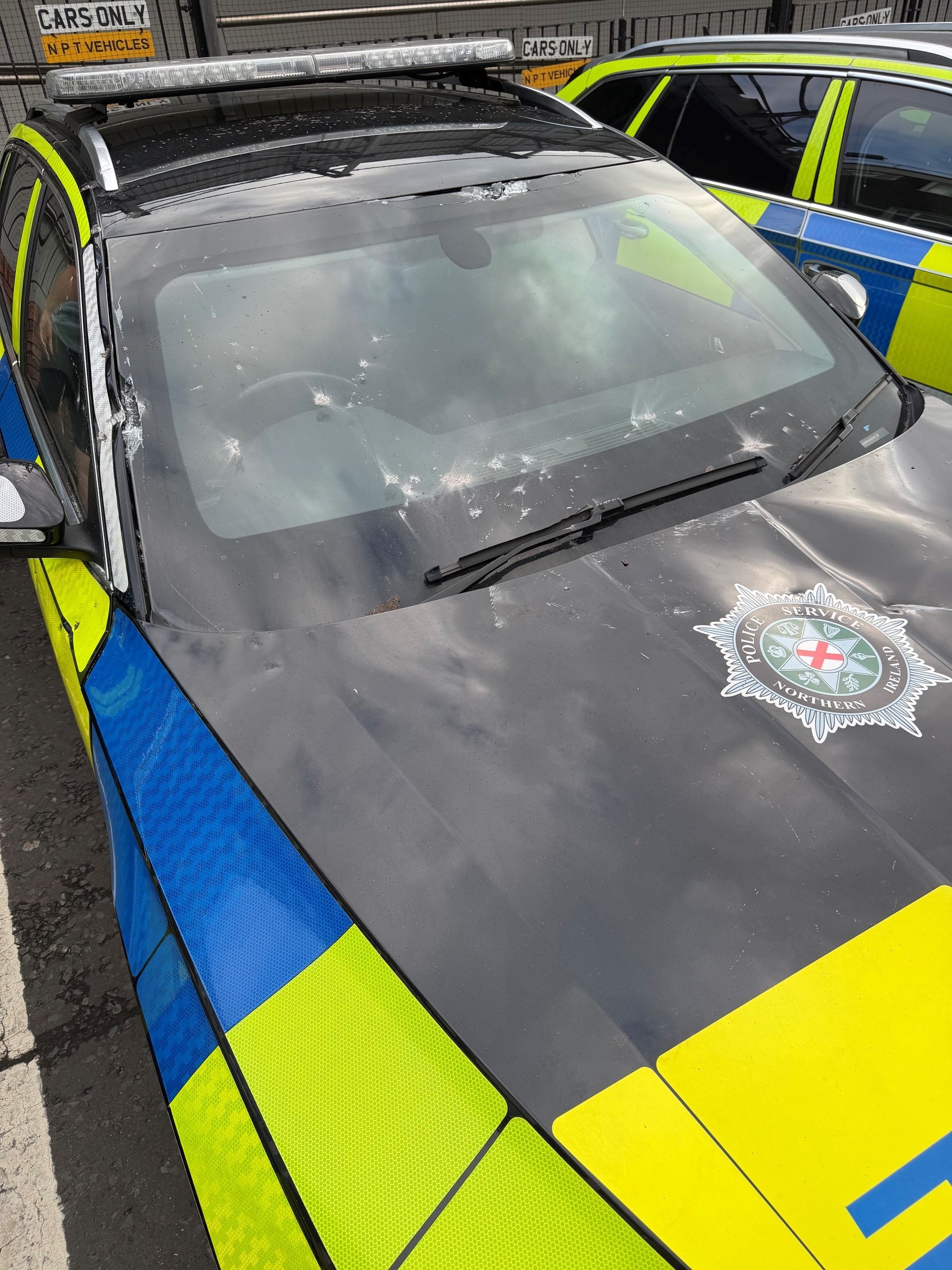 HIT: One of the police vehicles that was damaged during the incident