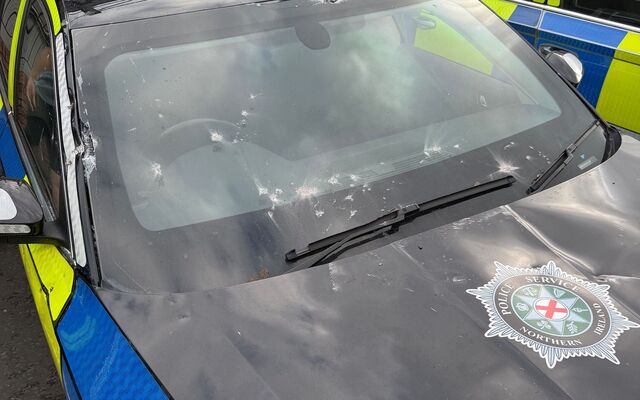 Five police cars damaged and officer injured in New Lodge stand-off