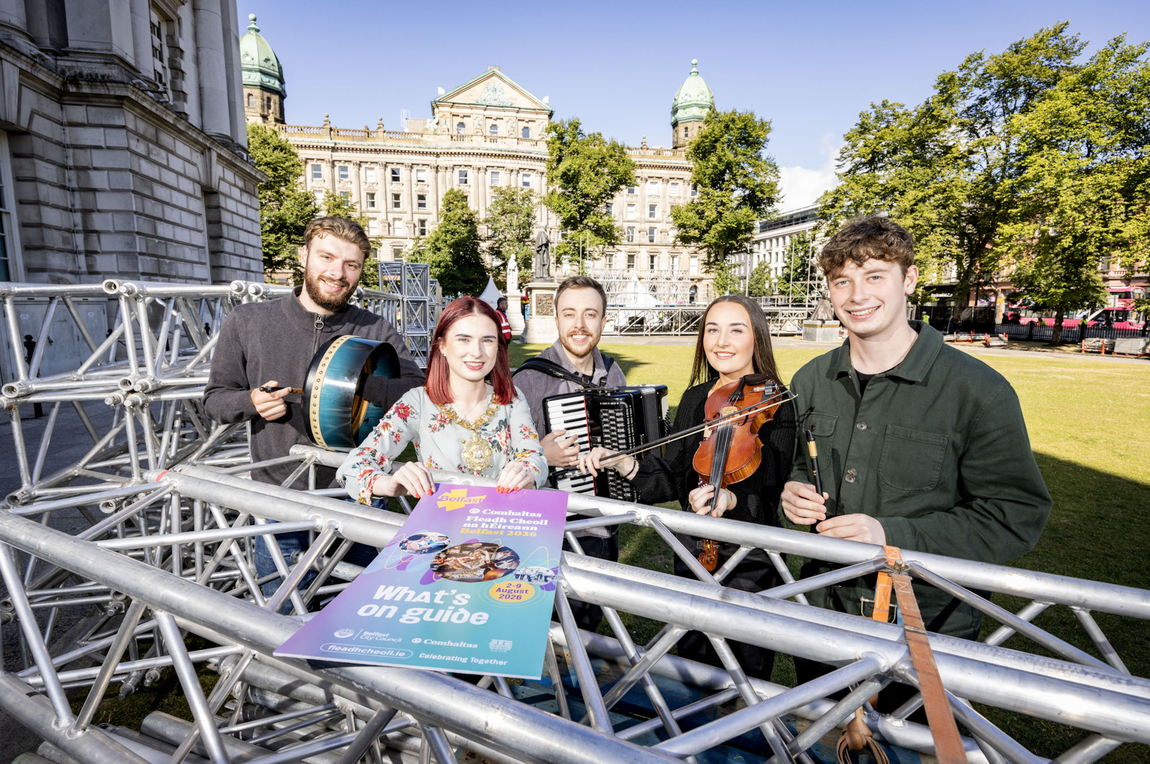 Traditional musicians check out the Gig Rig build with Lord Mayor of Belfast, Councillor Róis-Máire Donnelly before Belfast officially strikes the first note of the Comhaltas Fleadh Cheoil na hÉireann 2026 this Sunday