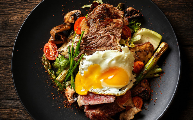 PLATING UP: Grilled sirloin steak, salad and runny fried egg