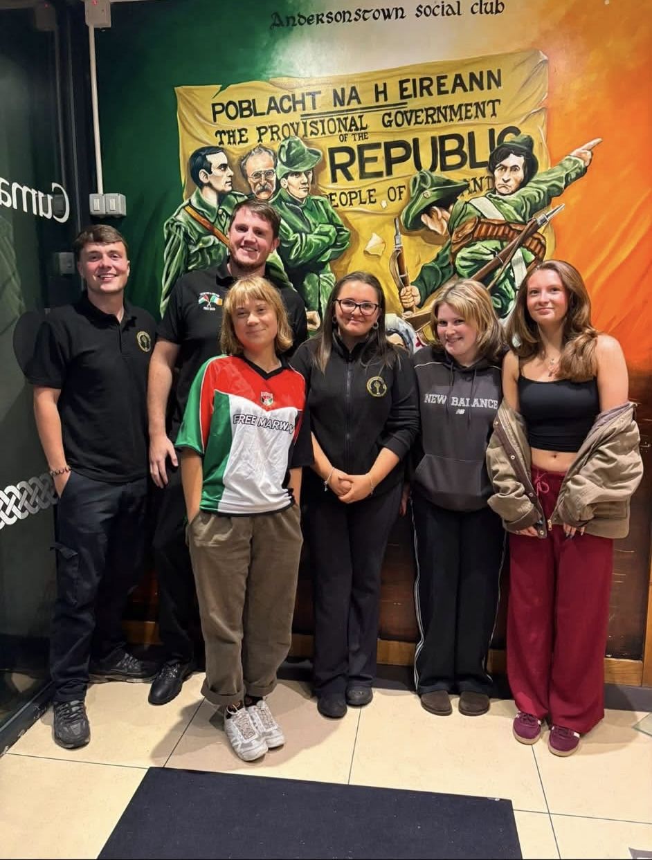 VISIT: Greta Thunberg with staff at Andersonstown Social Club (PD) on Wednesday