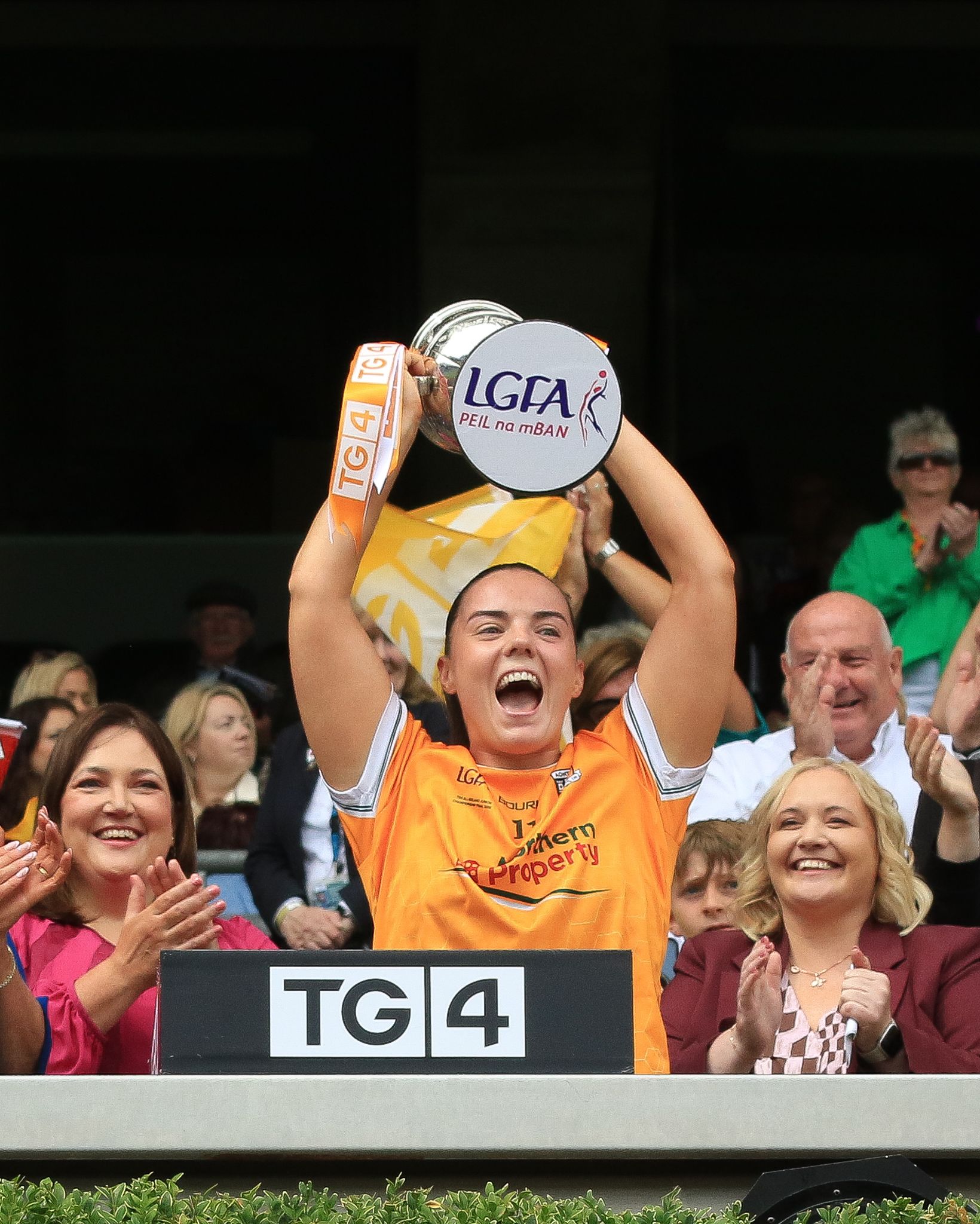 CAPTAIN FANTASTIC: Bronagh Devlin lofts the All-Ireland title on Sunday