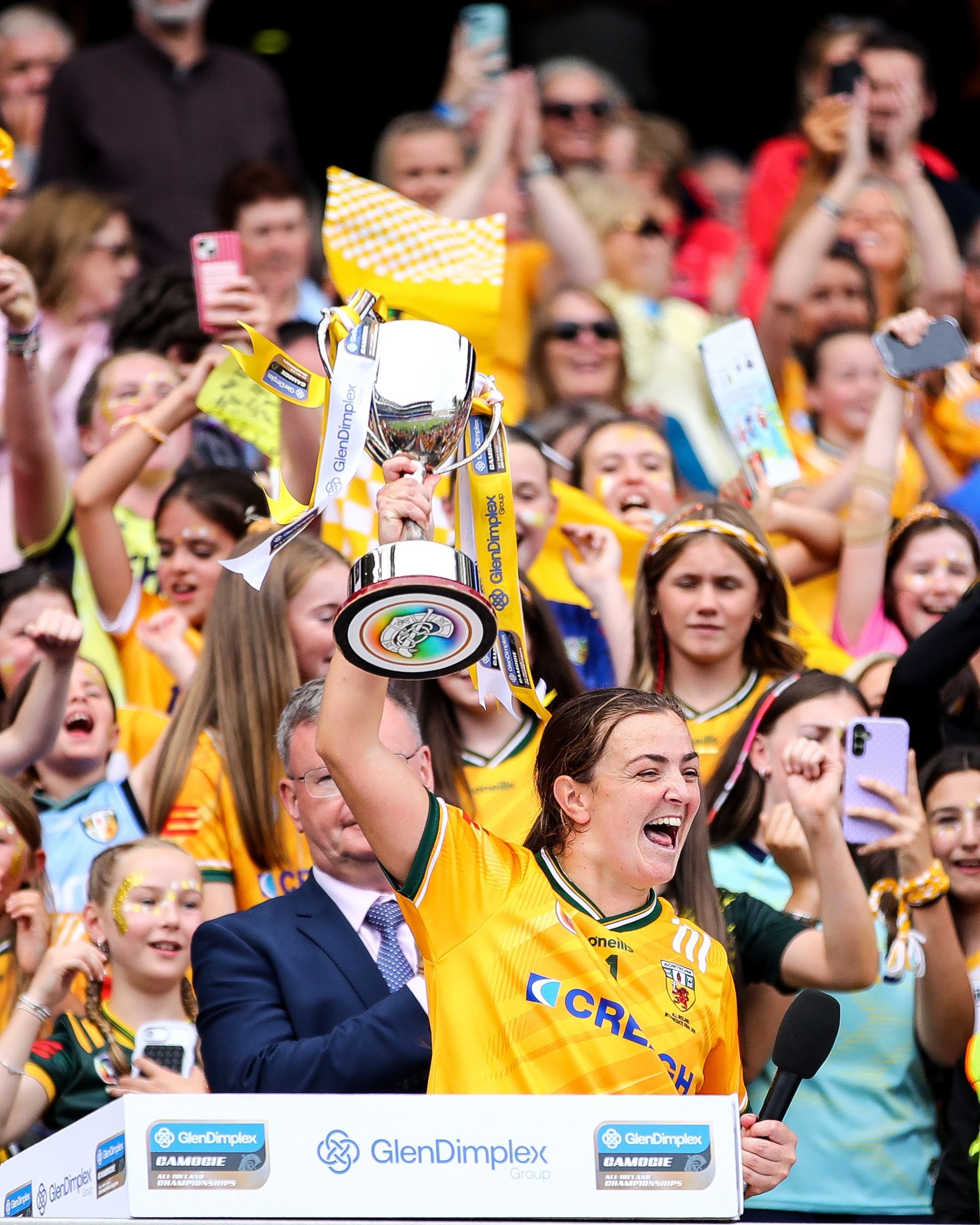 CHAMPS: Antrim captain Catríona Graham lofts the All-Ireland Intermediate title