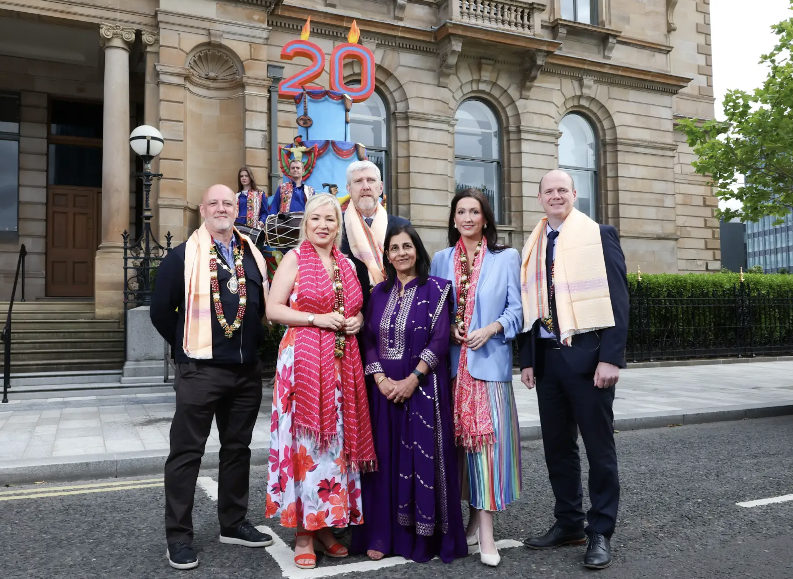 CULTURAL DIVERSITY: Nisha Tandon, Belfast Mela and CEO of ArtsEkta, with deputy Lord Mayor Councillor Hedley Abernethy, First Minister Michelle O’Neill MLA; deputy First Minister Emma Little-Pengelly; and Ministers John O\'Dowd and Gordon Lyons