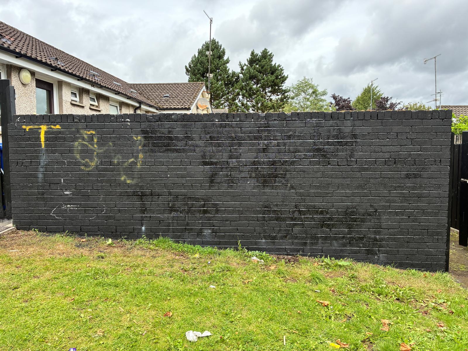 ROW: The painted over mural in Twinbrook