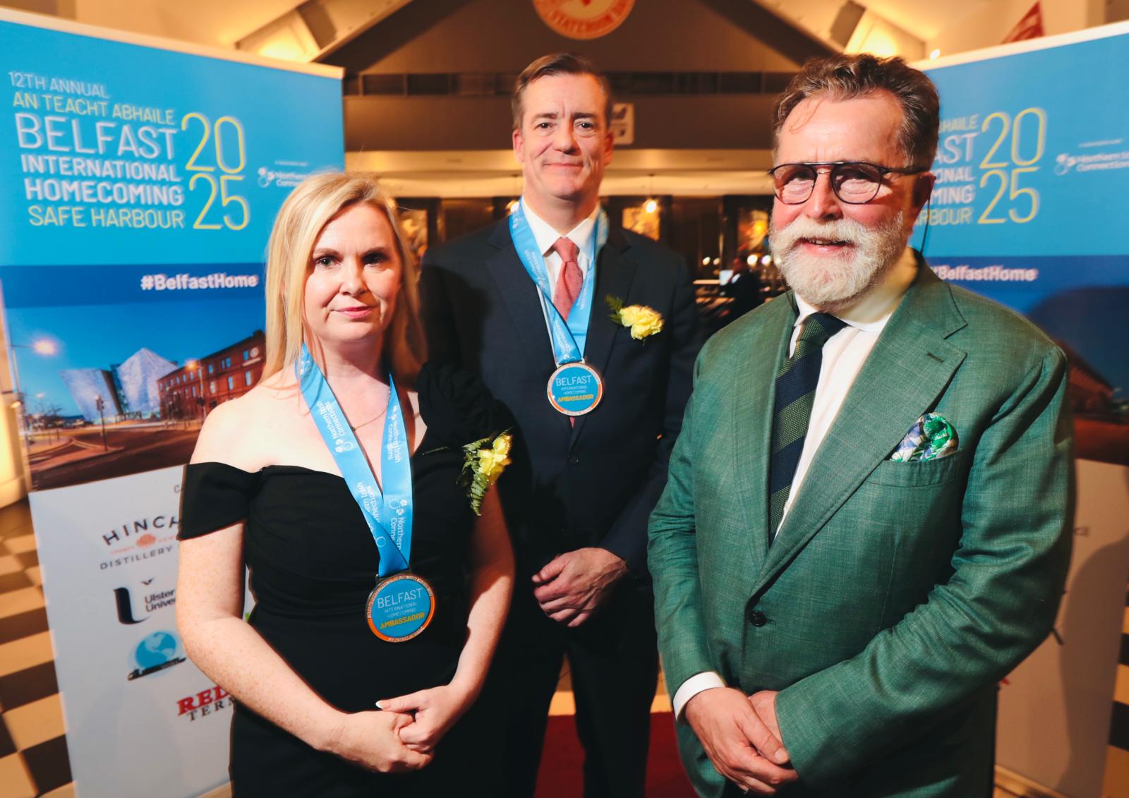 BOOSTERS FOR BELFAST: Lisa Walsh of Vancouver — via Beechmount —and Bernard McGuire of Washington D.C. were presented with Belfast Ambassador Medals at the 2025 Homecoming gala by Michael Lagan, Chairman of the Lagan Specialist Group
