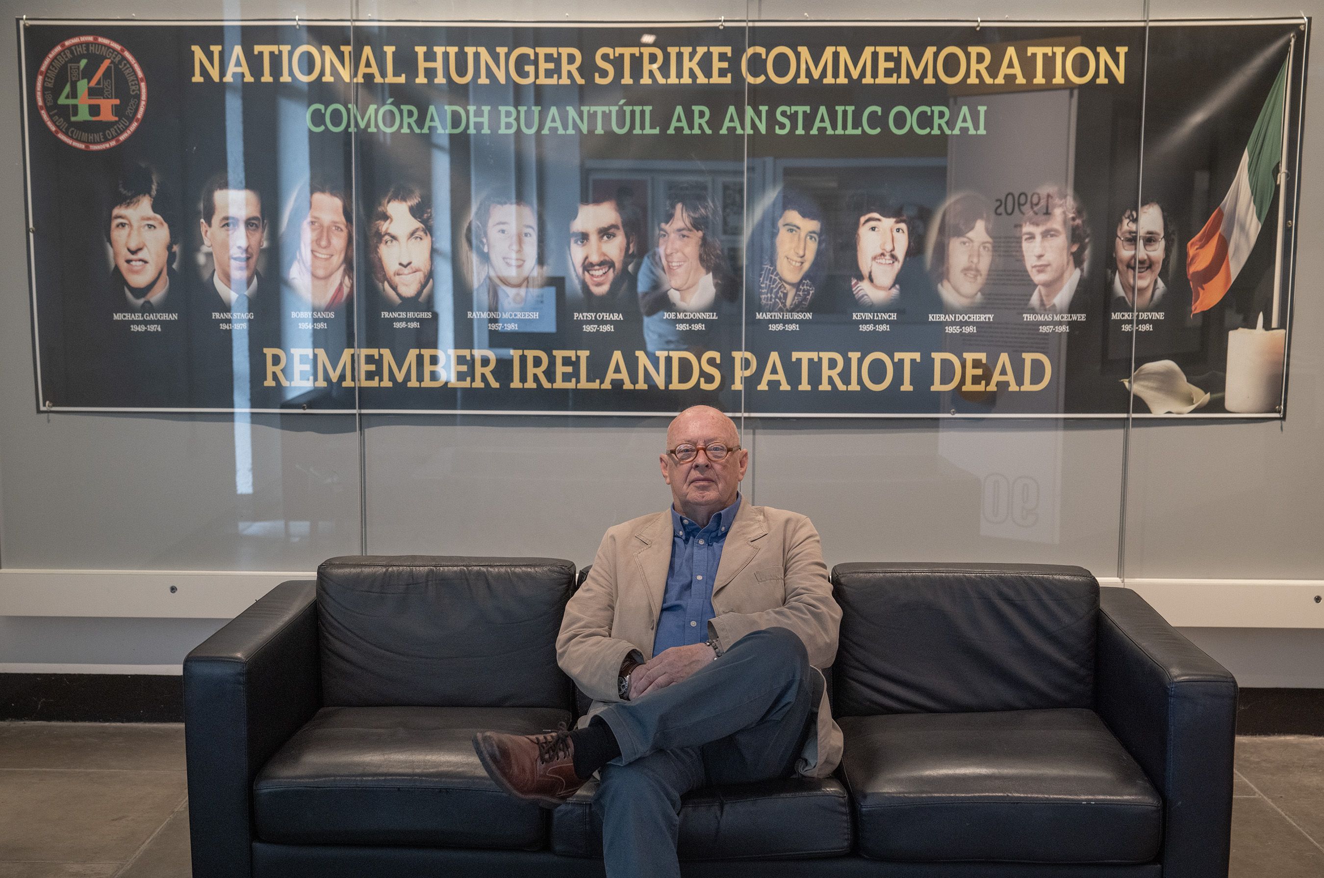 ICONIC: Joe Austin in front of the banner on display at the Ulster Museum