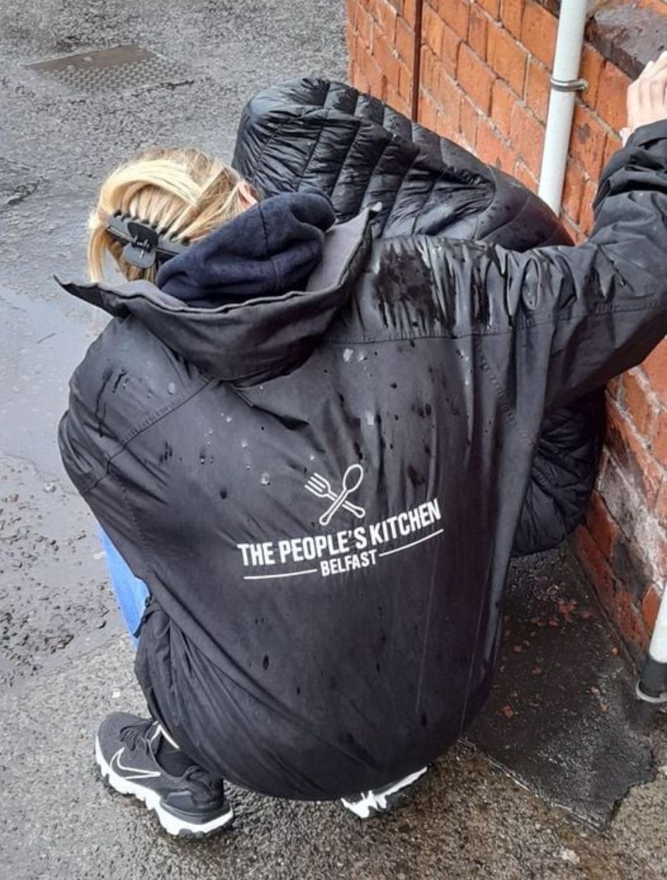 LIFE ON THE STREETS: Claire O\'Neill providing a listening ear to a young woman outside the People\'s Kitchen