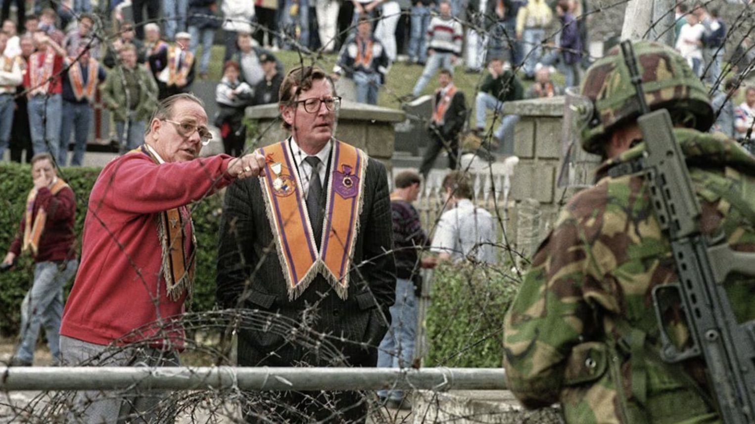 BARRIER: A major security operation was set in motion to aid the Orange Order to march down the Garvaghy Road in the late \'90s