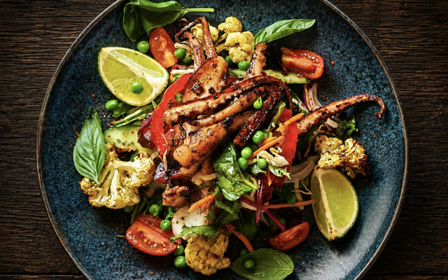 PLATING UP: Grilled octopus with salad roasted cauliflower and basil