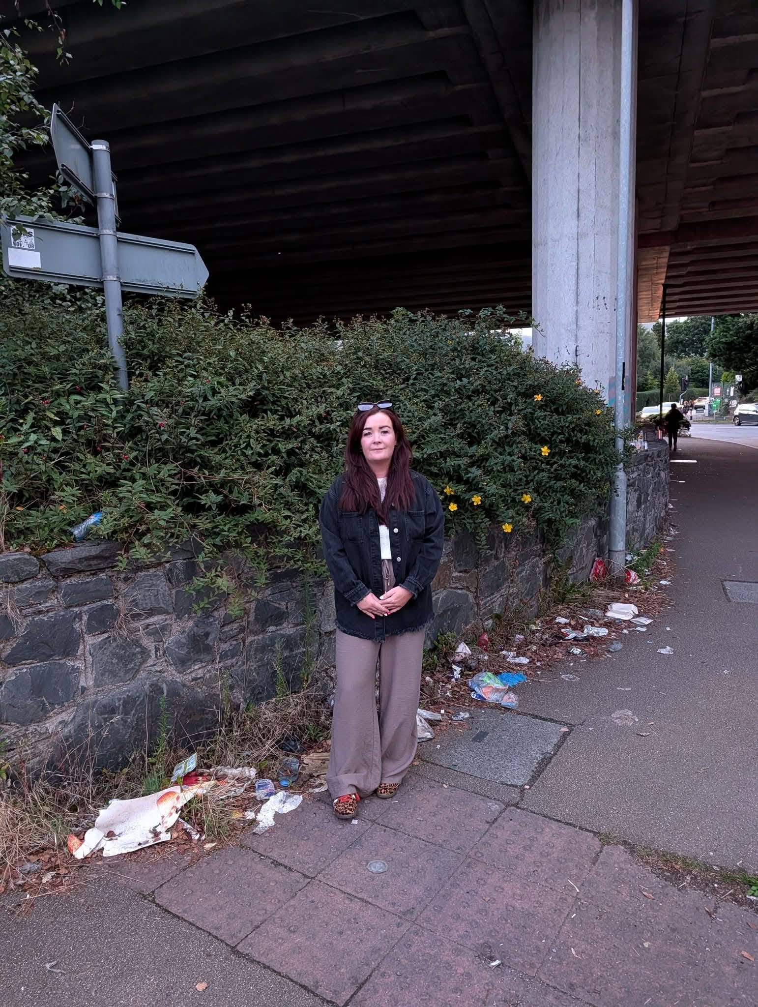 EYESORE: Councillor Natasha Brennan at Stockmans Lane roundabout