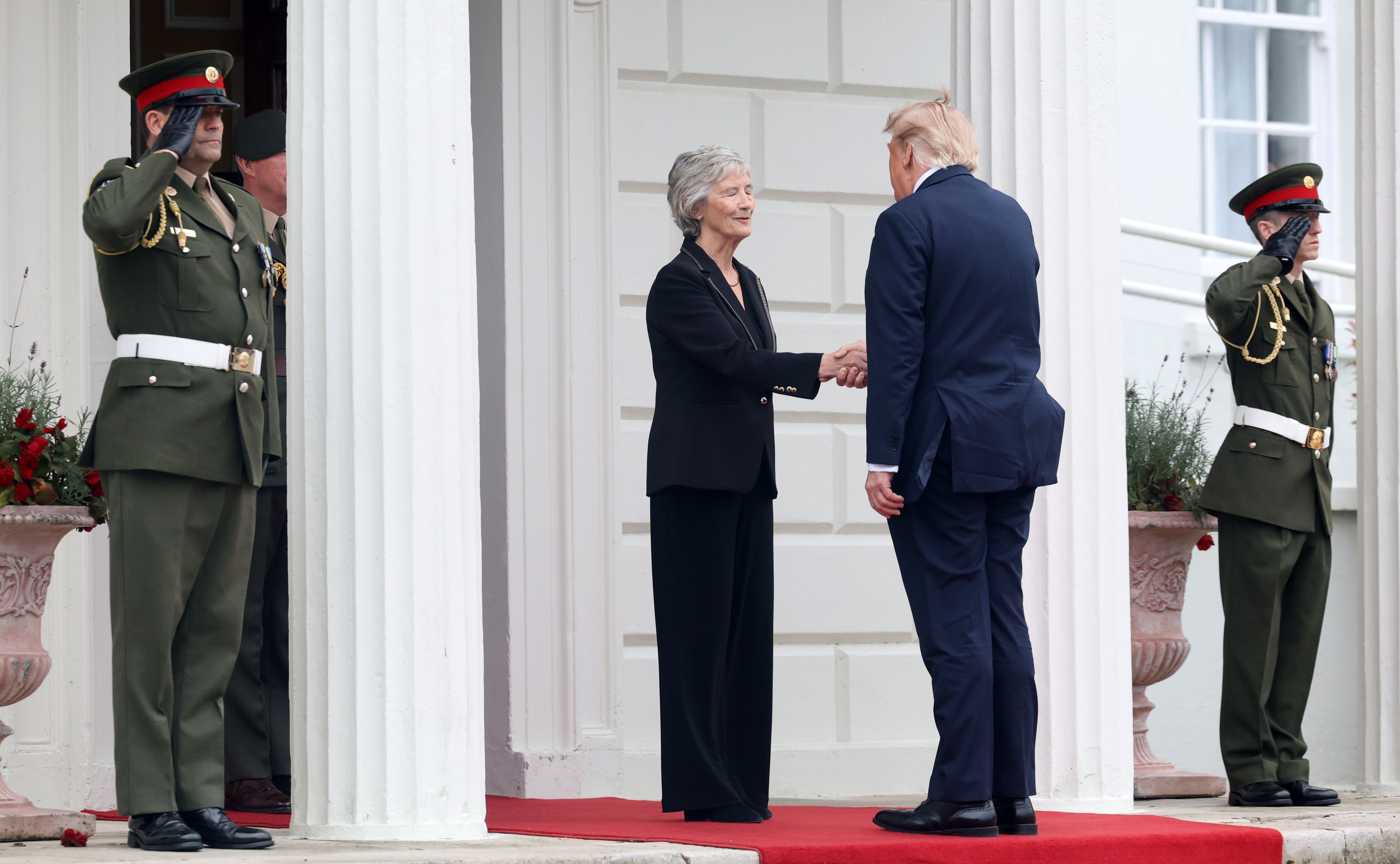 FÁILTE: President Catherine Connolly greets President Trump to Áras an Uactaráin this morning in Dublin