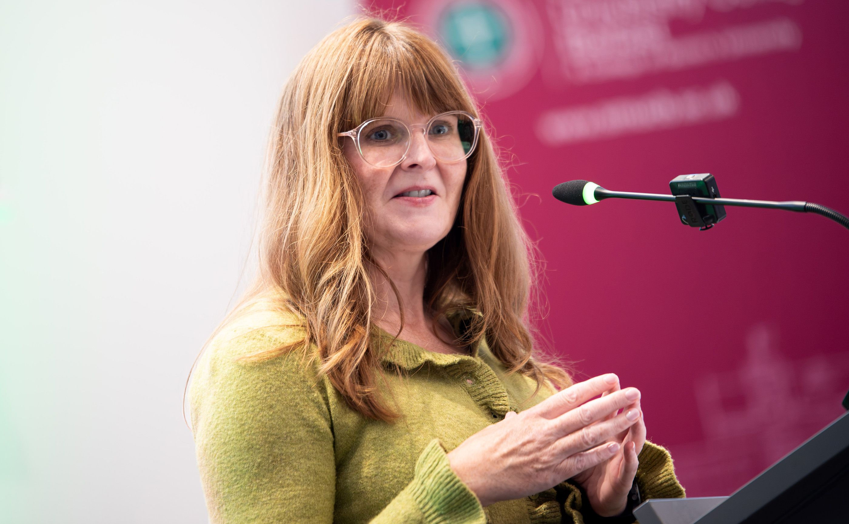 LIFE LESSON: Economy Minister Caoimhe Archibald speaking at the Aisling Bursaries