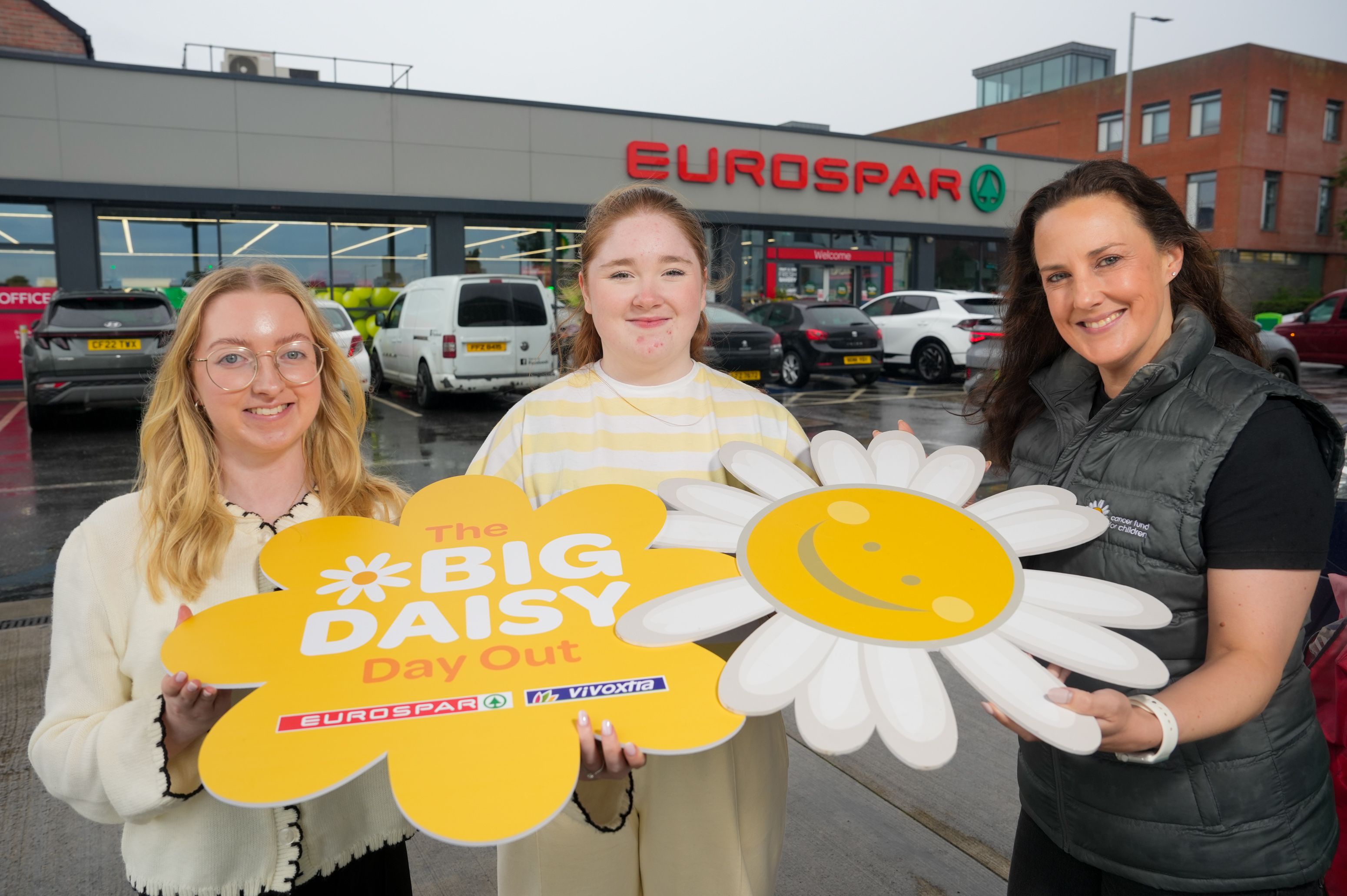 DIGGING DEEP: Bethany Priestly from EUROSPAR NI with Cancer Fund for Children Young Ambassador Lucy (13) and the charity’s Fundraising Manager, Clare Galbraith