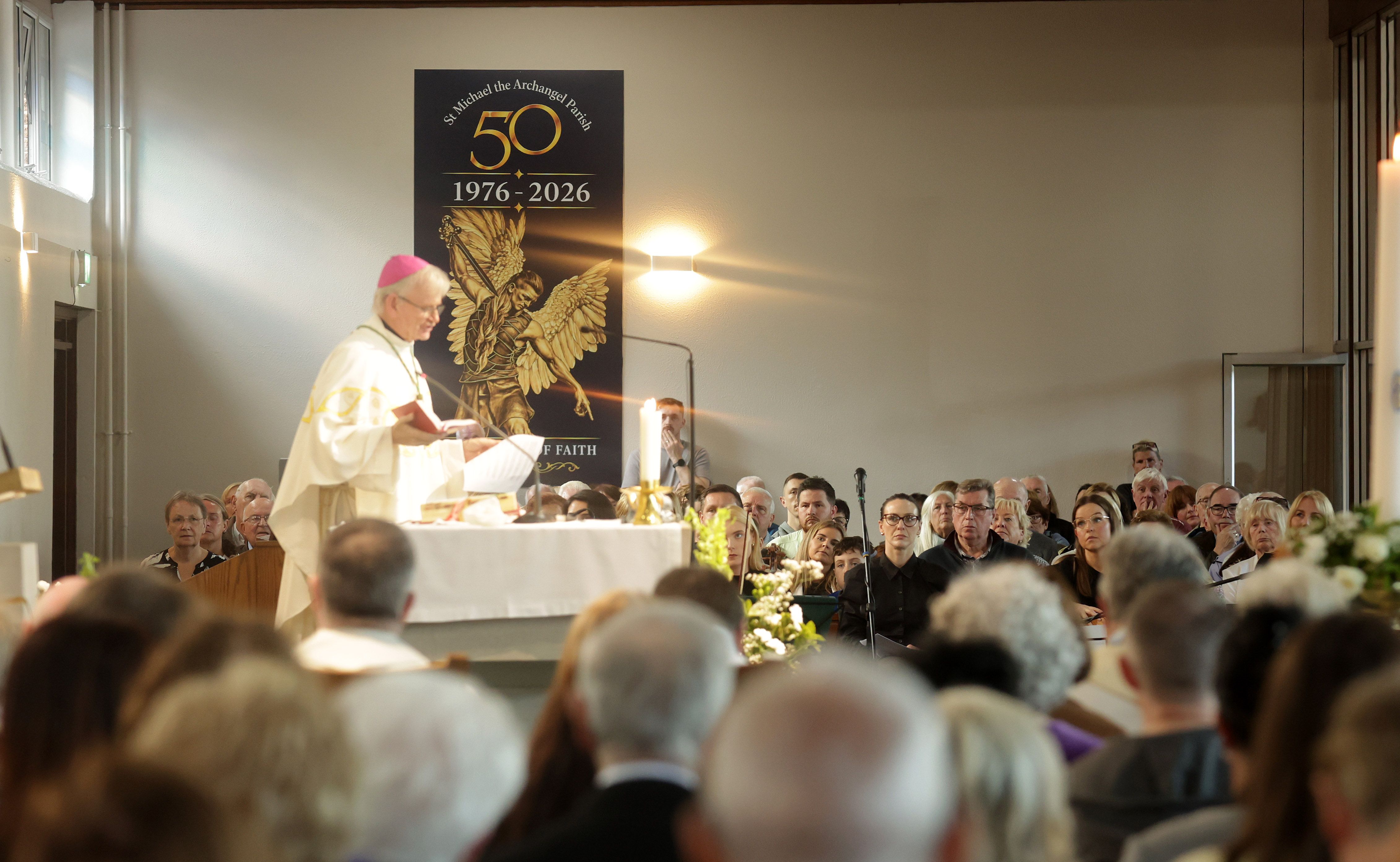 PRAYERS: Bishop Alan McGuckian saying Mass at St Michael\'s on Saturday