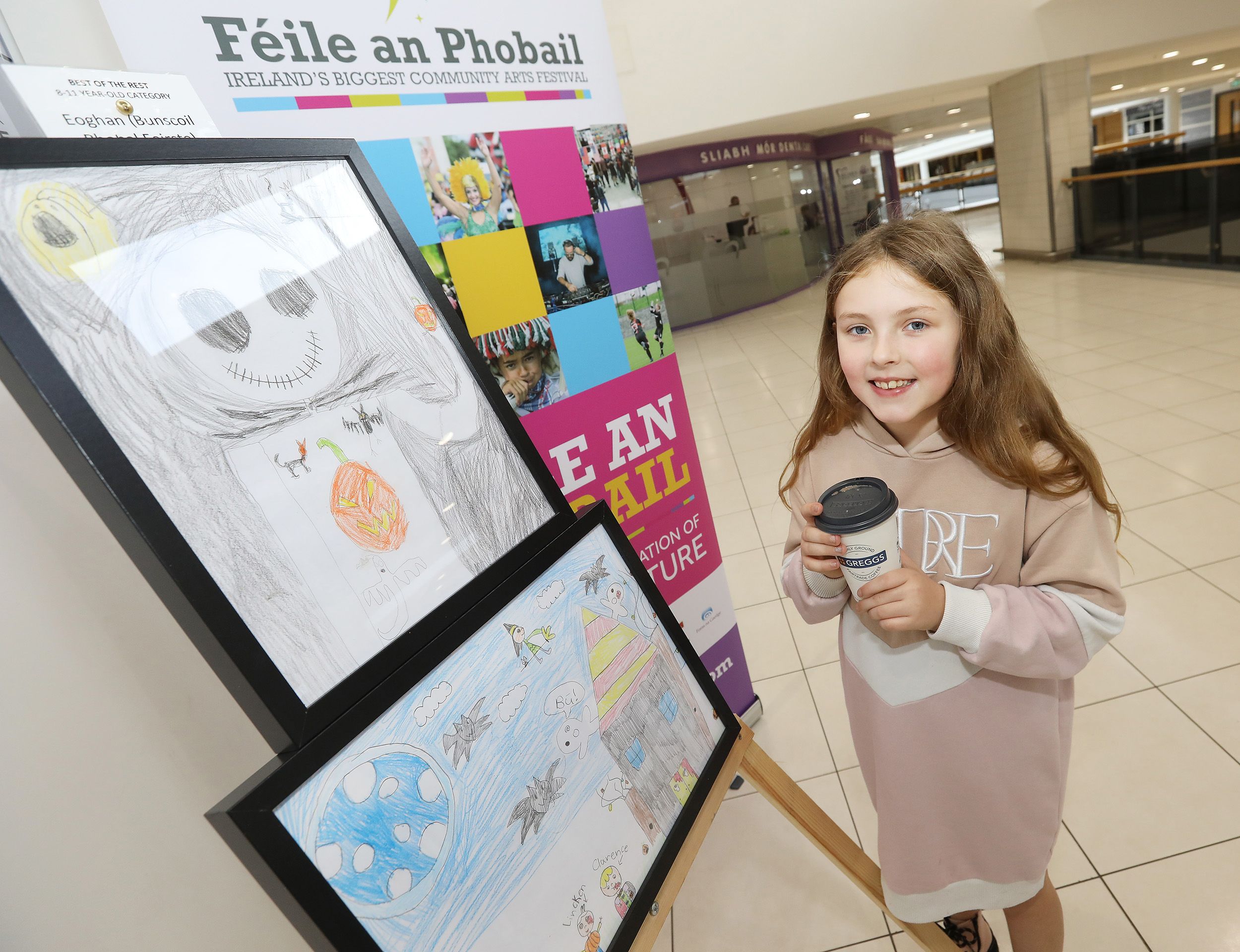 Maisy Power enjoying her extended half-term break in the Kennedy Centre viewing the Children's Artwork in the Féile Draíocht virtual festival