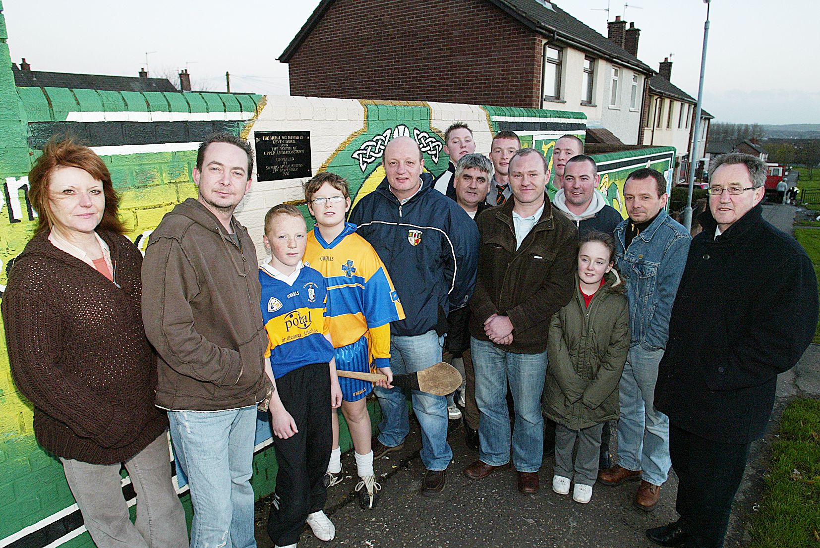 TALENTED ARTIST: Flashback to 2006 as Kevin Dorris’s (left of picture) Gaelic mural, which he completed on the Shaws Road with the youth of Upper Andersonstown, is unveiled by Terence McNaughton