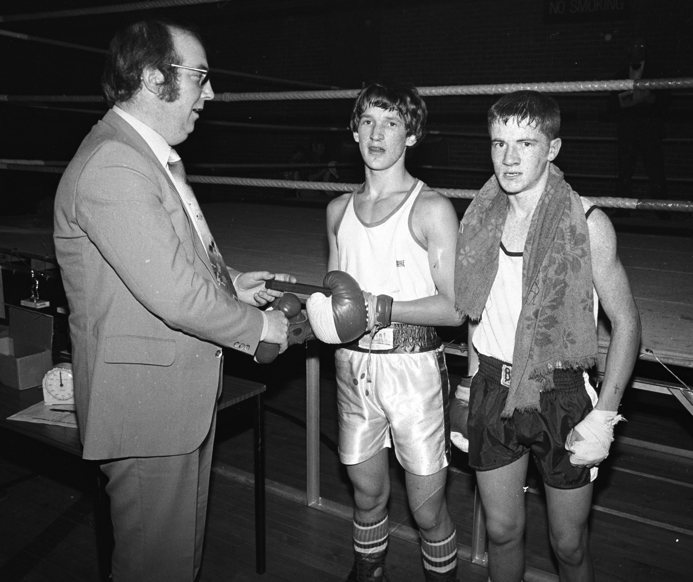 Gerry Fegan presents prizes to Damien Denny and Brendan Murphy in Andersonstown Leisure Centre