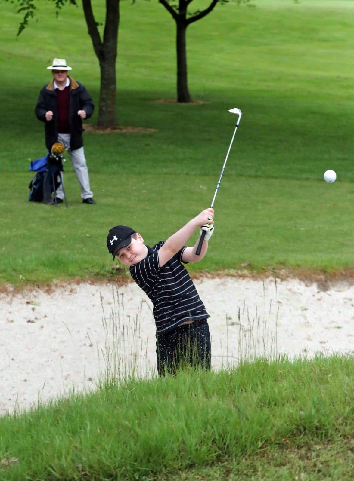 DREAM SHOT: Aaron putts his way out of the bunker