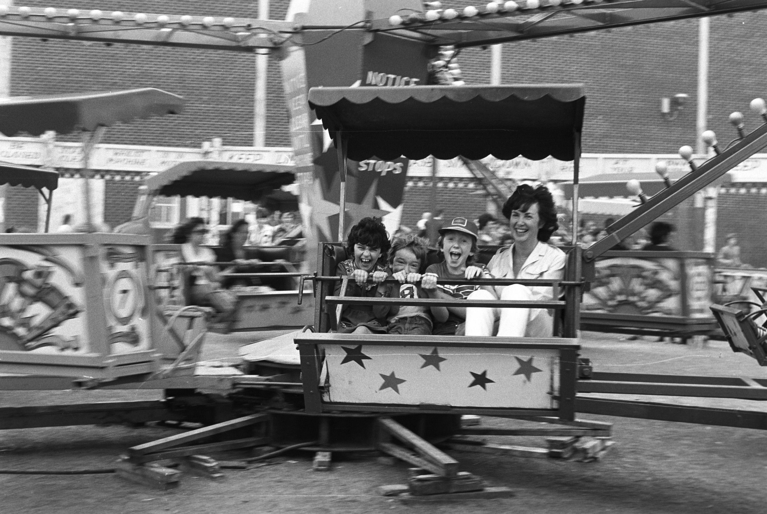 FUN: As the summer of 1981 came to an end families enjoyed all the fun of the fair when Cullen’s Amusements came to the grounds of Andersonstown Leisure Centre