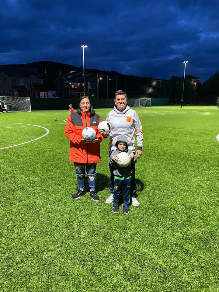 Tanya Smith, Daniel Baker and Conor Baker at Lagmore Youth Project's drop-in football event