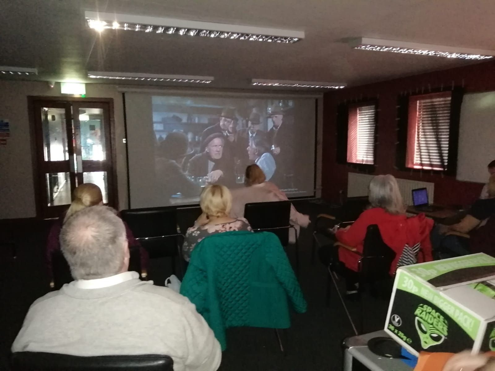 Seniors enjoying the screening of Darby O'Gill