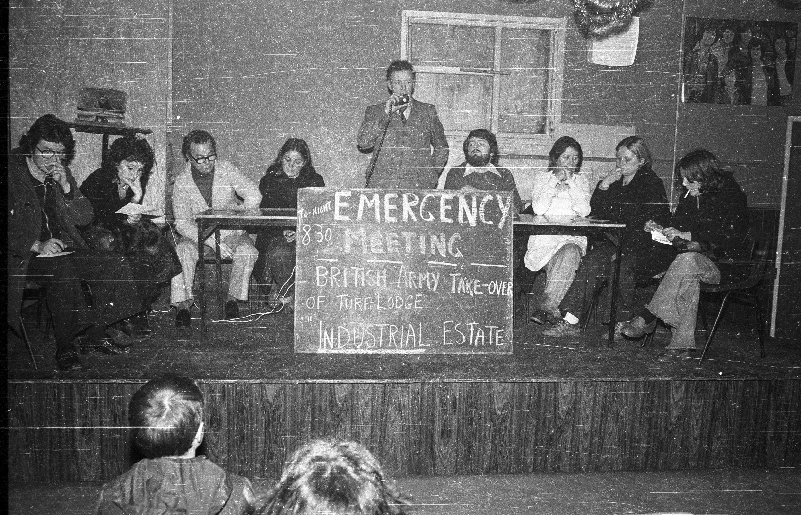 EMERGENCY MEETING: The British Army Take-over Turf Lodge Industrial Estate see Sheila McVeigh and Martin Lynch flank the speaker, Chair Sean Morrisey, with Kathleen Thibideau and Brother O'Connell from Gort na Mona Secondary School present