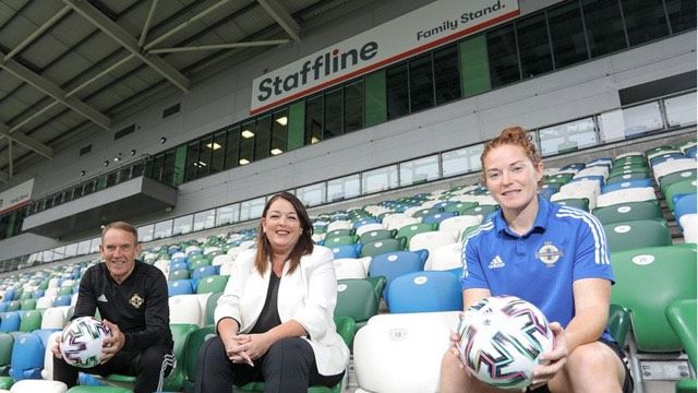 Tina McKenzie, CEO of Staffline with Northern Ireland Women's team manager Kenny Shiels and captain, Marissa Callaghan
