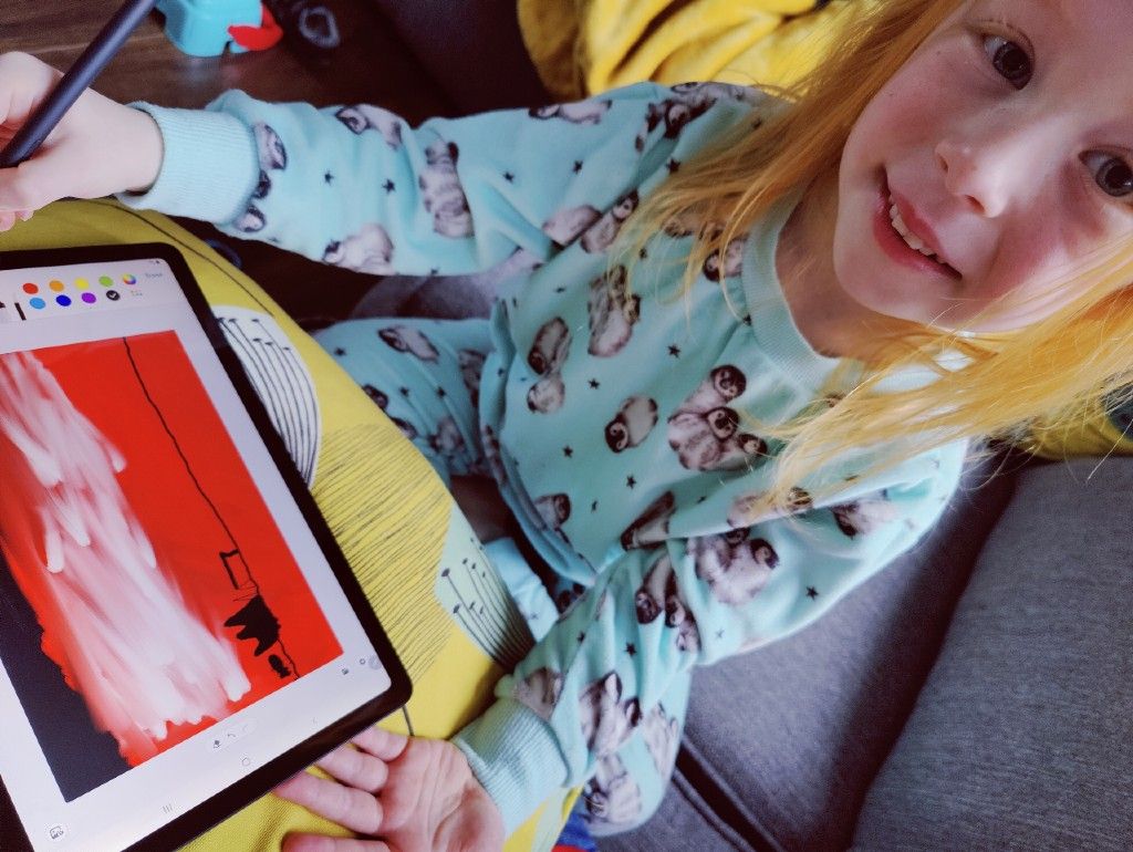 HELPING HAND: Olivia (5) has been helping her dad, Stephen with the Christmas card designs