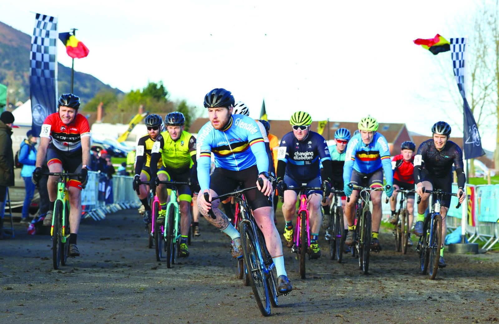 Andy Ross leads the field out at the start of the B race